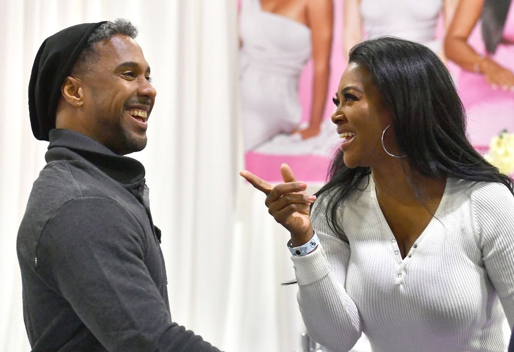 Marc Daly and Kenya Moore attend 2020 Bronner Brothers International Beauty Show at Georgia World Congress Center on February 08, 2020 in Atlanta, Georgia | Photo: Getty Images