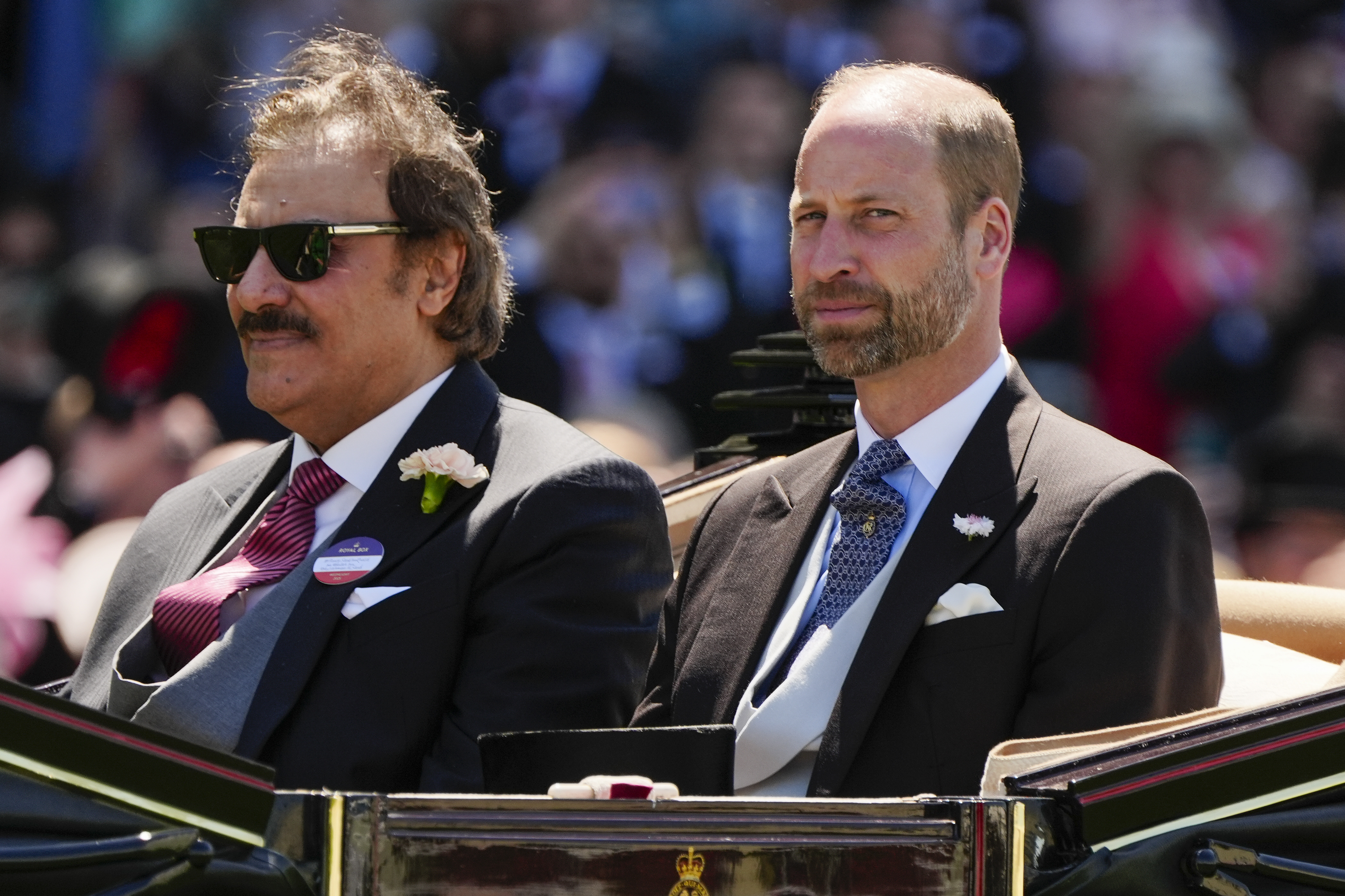 Prince Saud bin Khalid Al-Saud and Prince William ride together during the carriage procession on June 18, 2025, at Royal Ascot, with the Prince of Wales maintaining a composed expression amid the fanfare.