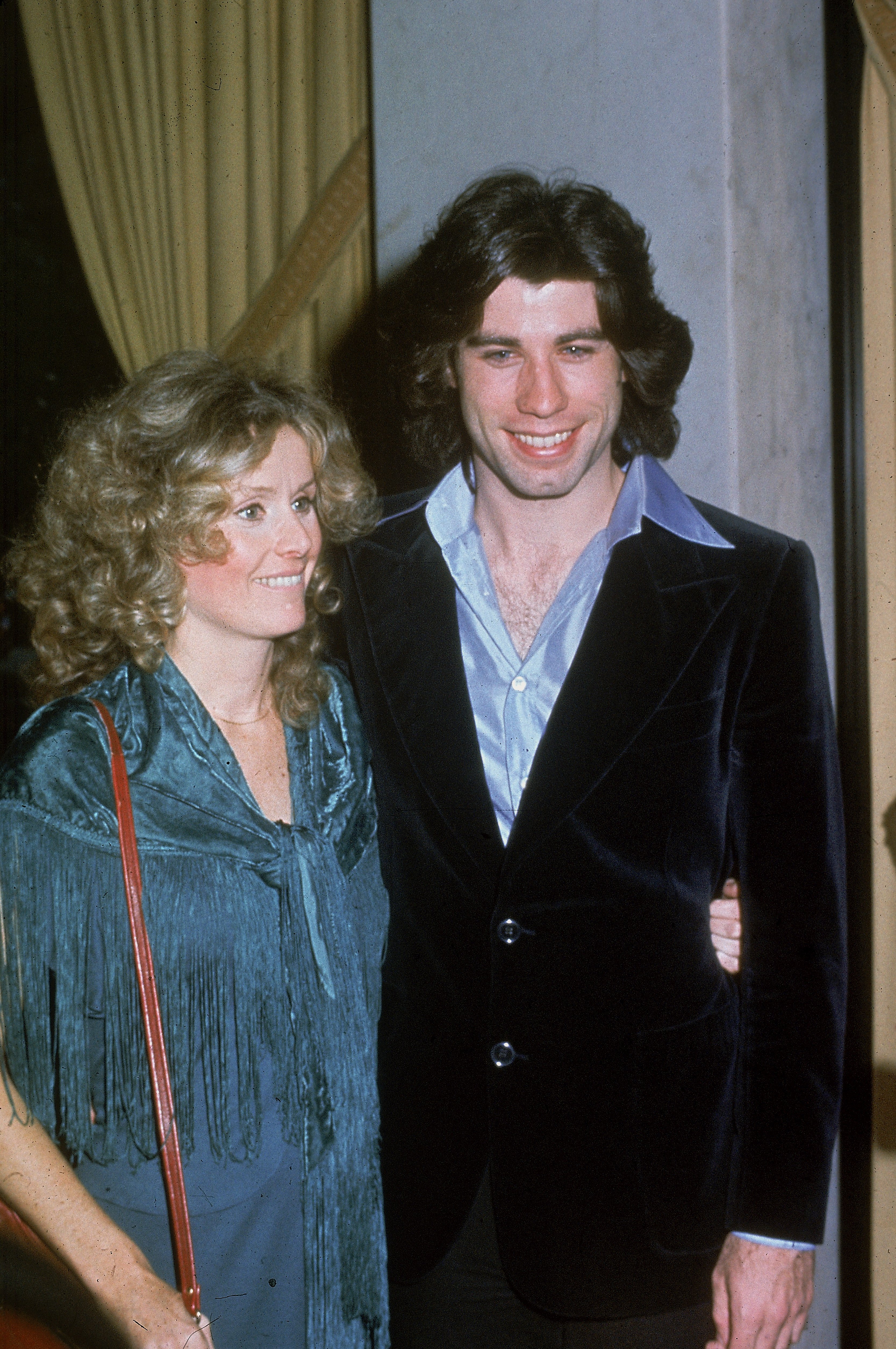 American actor John Travolta poses with his girlfriend Dianna Hyland at the Golden Apple Awards, 1976. | Source: Getty Images