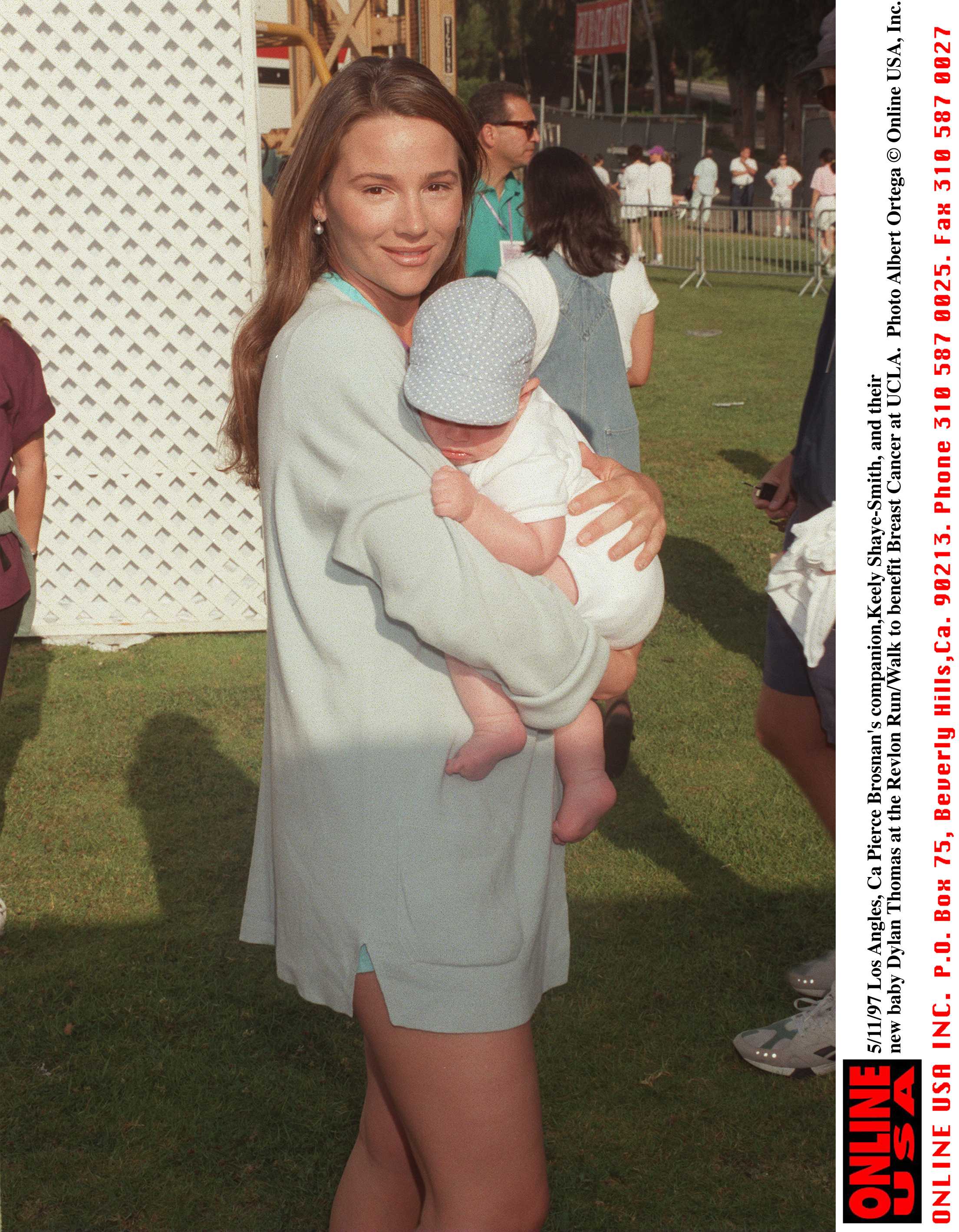 The lady and her son at the Revlon Run/Walk to benefit breast cancer at UCLA on March 12, 1997 | Source: Getty Images