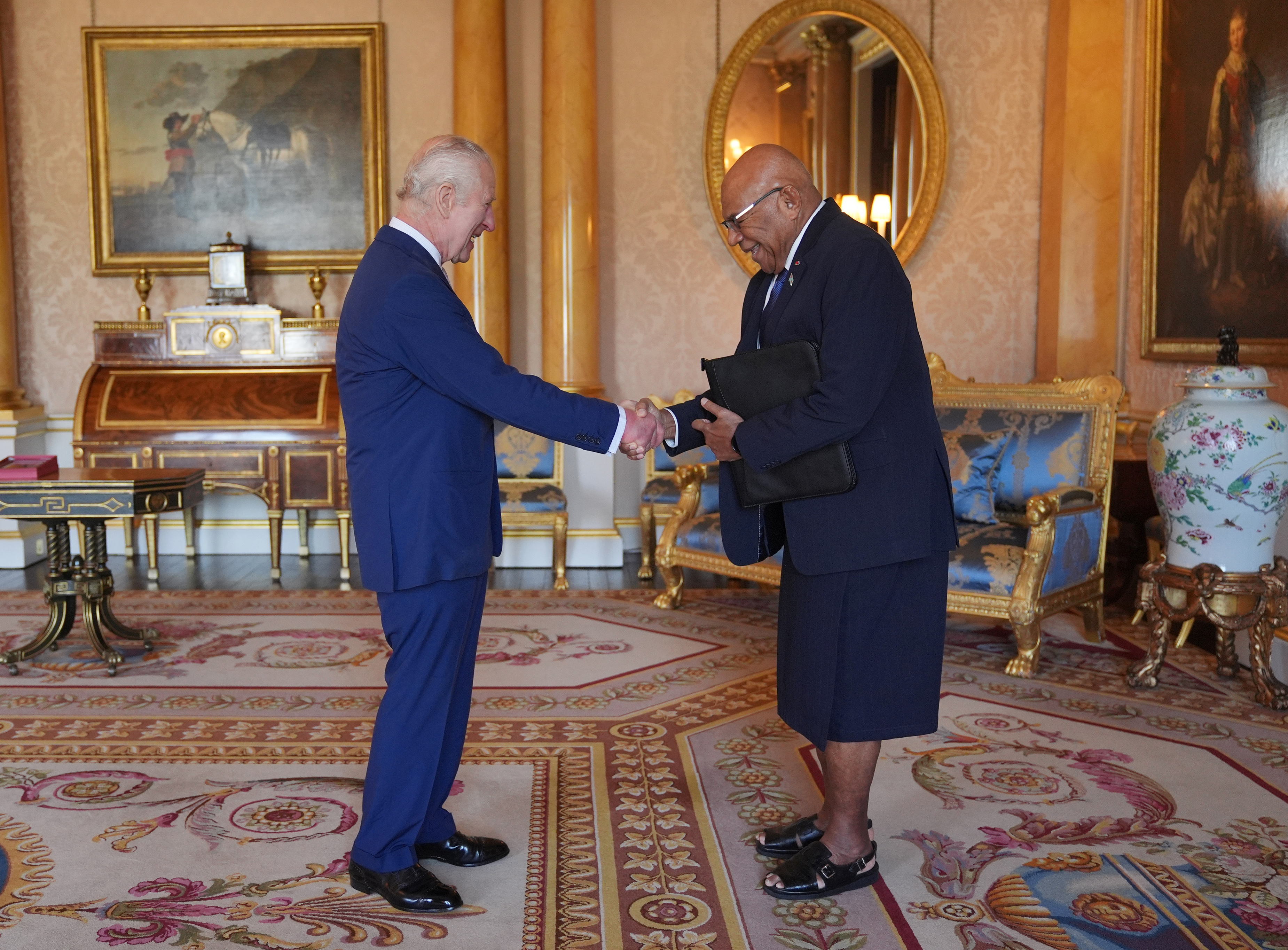 King Charles III and the Prime Minister of Fiji Sitiveni Rabuka during an audience at Buckingham Palace in London, England on May 7, 2024 | Source: Getty Images