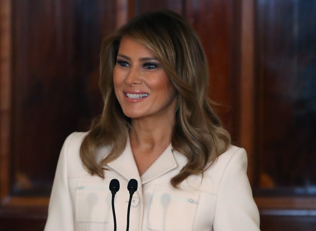 Melania Trump stand at a podium as she delivered at speech at the Governors Spouses Luncheon in the Blue Room of the White House on February 10, 2020, in Washington, DC | Source: Mark Wilson/Getty Images