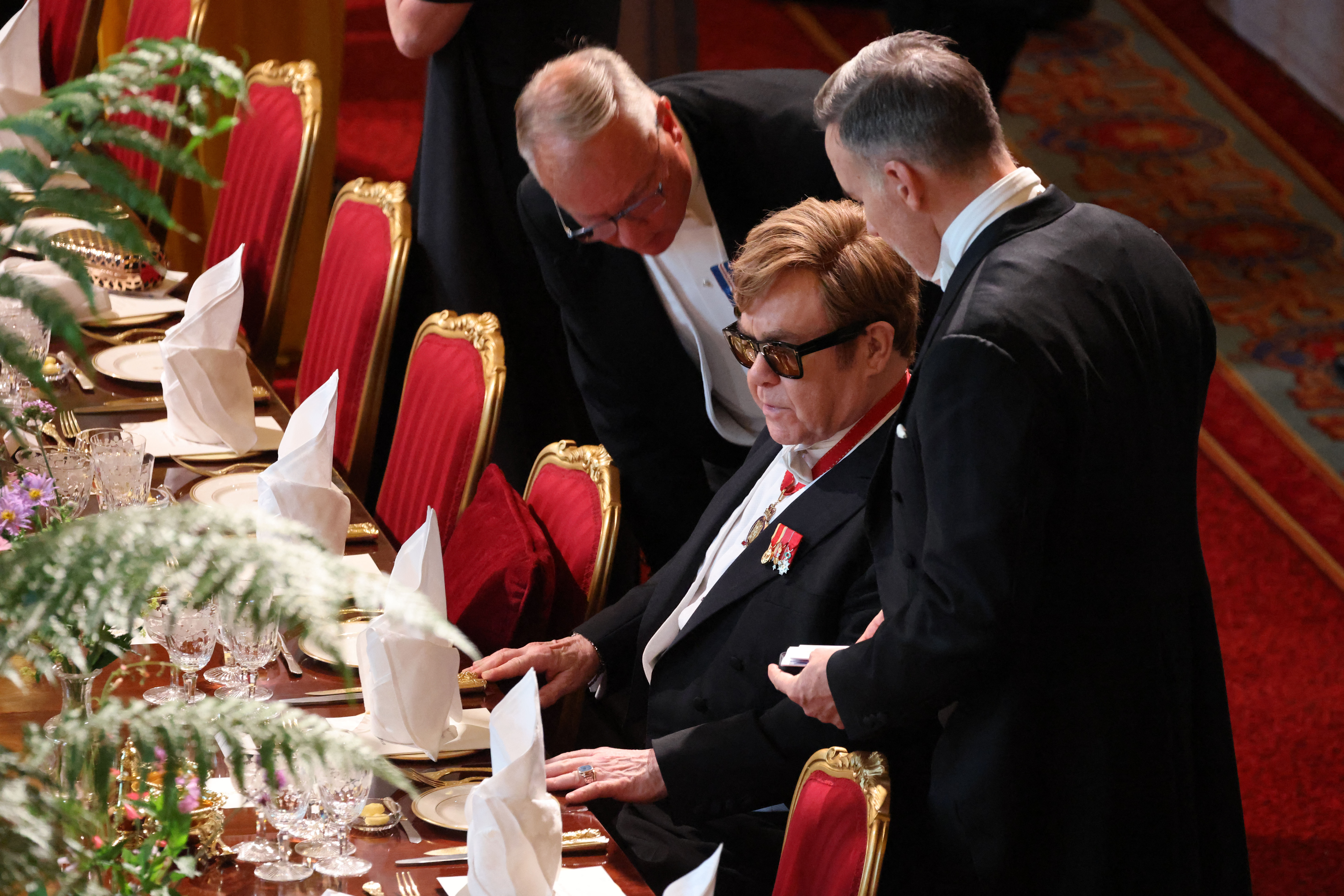 Elton John and David Furnish at the State Banquet for President Emmanuel Macron and Brigitte Macron at Windsor Castle on July 8, 2025, in England. | Source: Getty Images