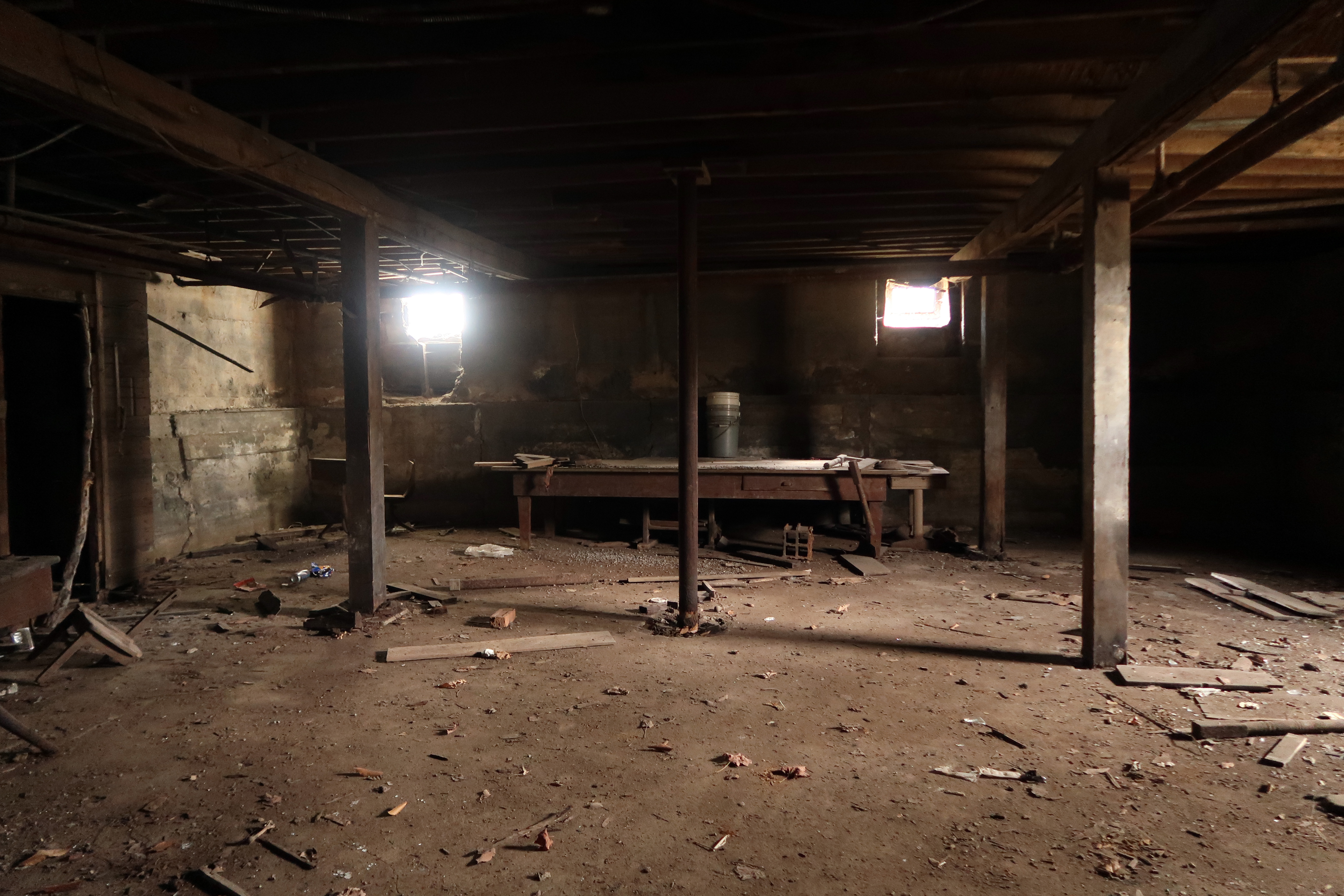 Dark basement of an abandoned building. Natural light. | Source: Shutterstock