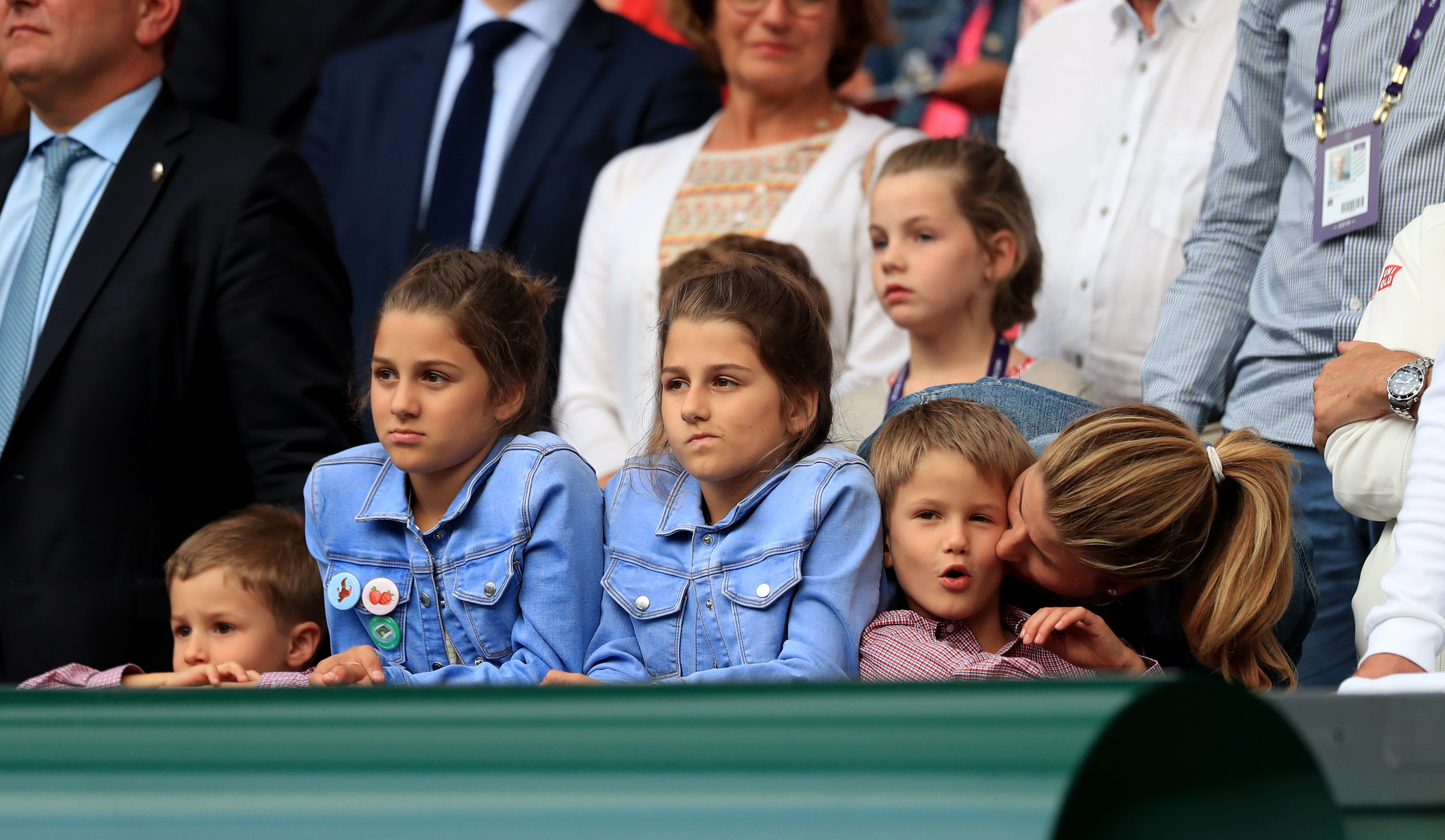 Myla Rose and Charlene Riva Federer with their twin brothers Leo and Lennert, and mother Mirka Federer at Wimbledon on July 14, 2019. | Source: Getty Images
