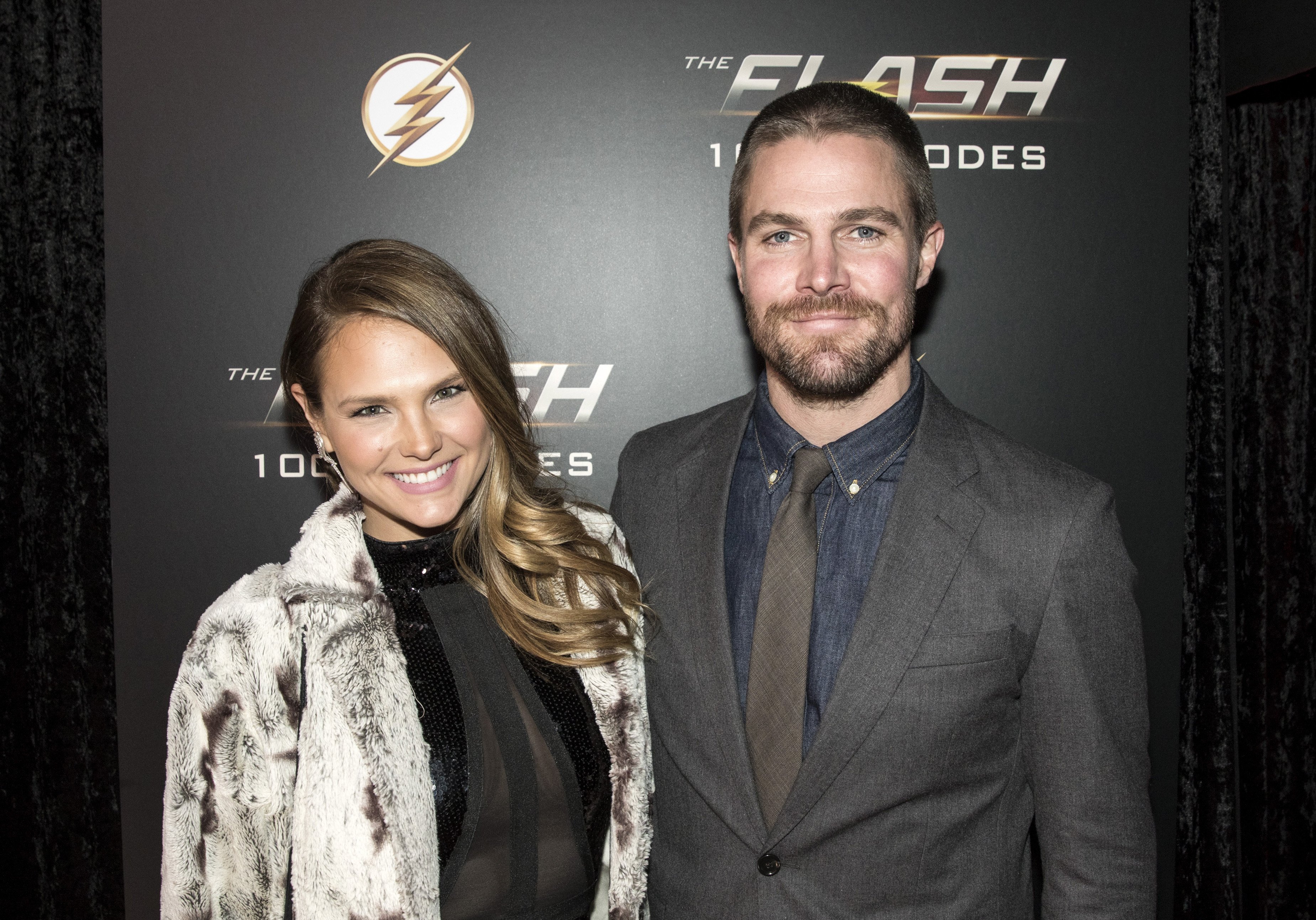 Actors Cassandra Jean and Stephen Amell attend the red carpet at "The Flash" 100TH Episode Celebration at the Commodore Ballroom on November 17, 2018 in Vancouver, Canada. | Source: Getty Images