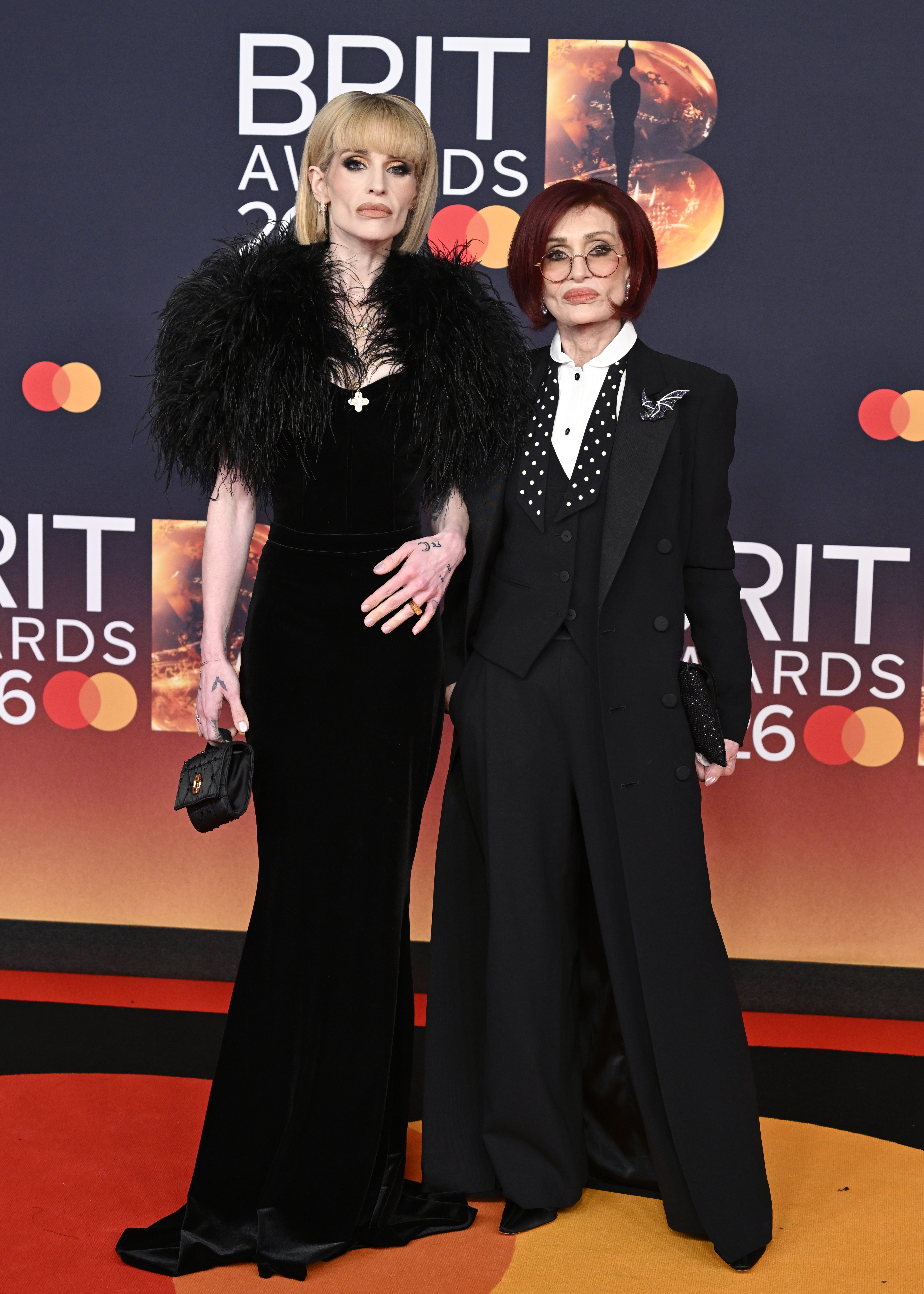 Kelly and Sharon Osbourne attend The BRIT Awards 2026 at Co-op Live on 28 February 2026 in Manchester, England. | Source: Getty Images