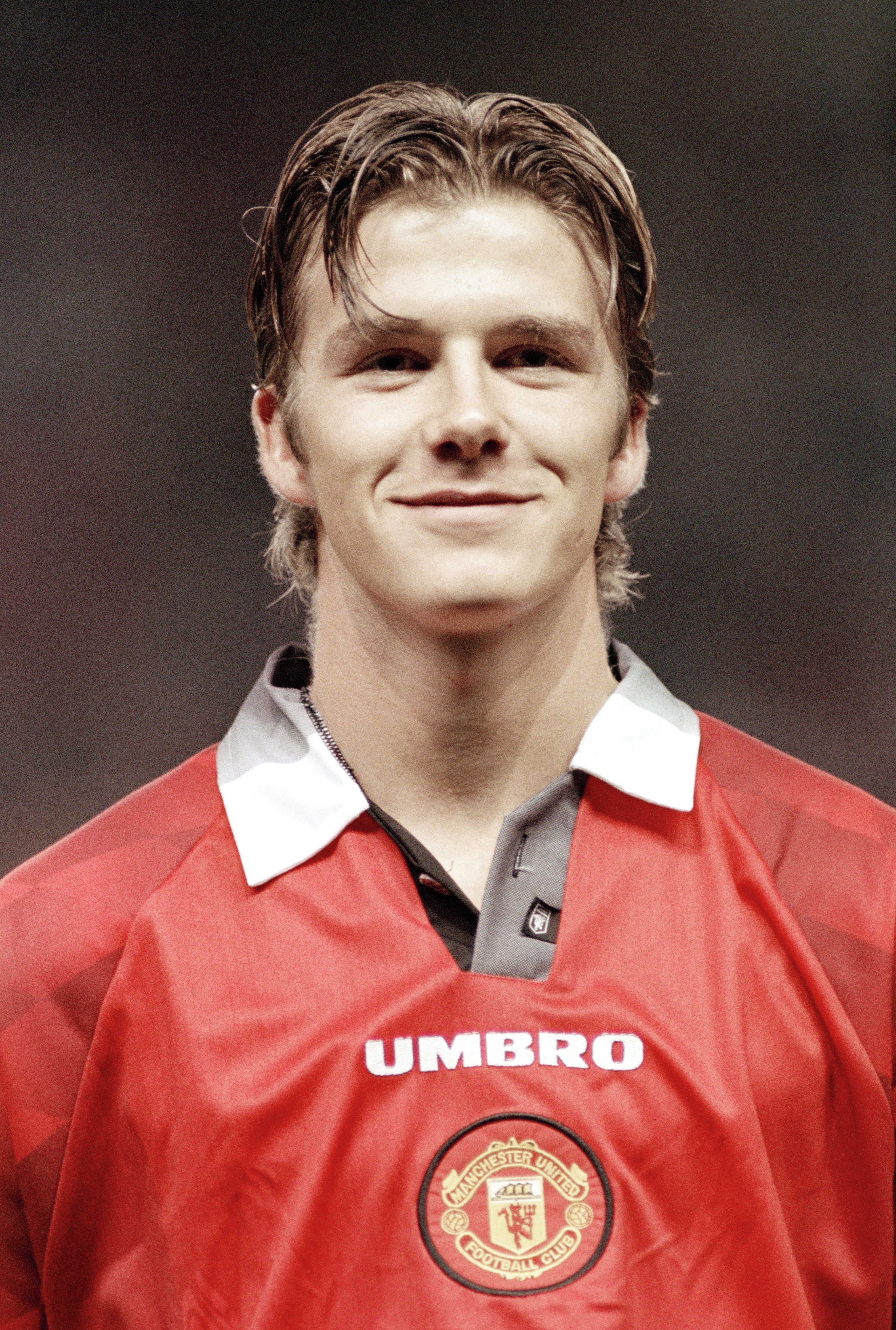 David Beckham of Manchester United poses before the UEFA Champions League match on September 25, 1996, in Manchester, England | Source: Getty Images