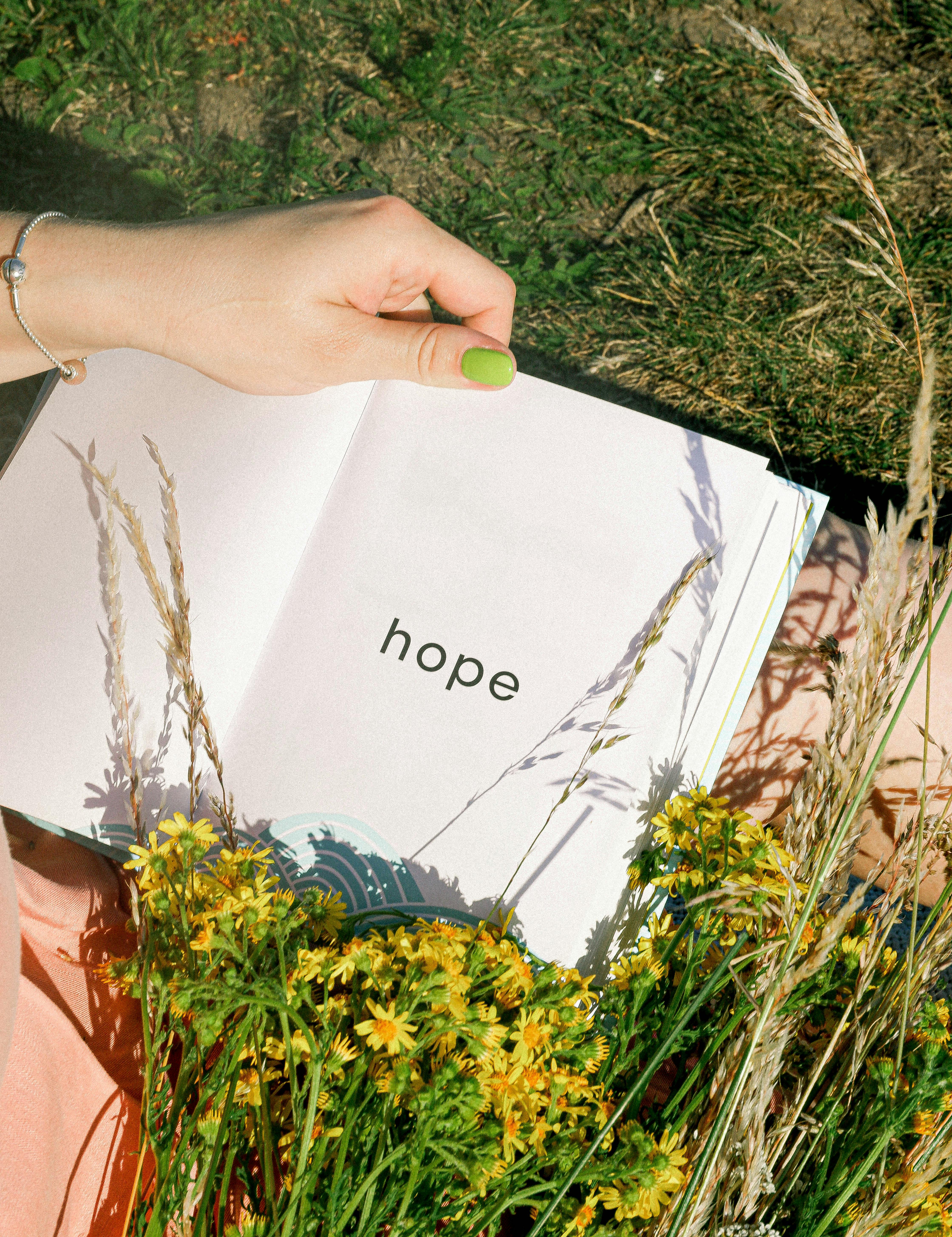 The word "Hope" on a book | Source: Pexels