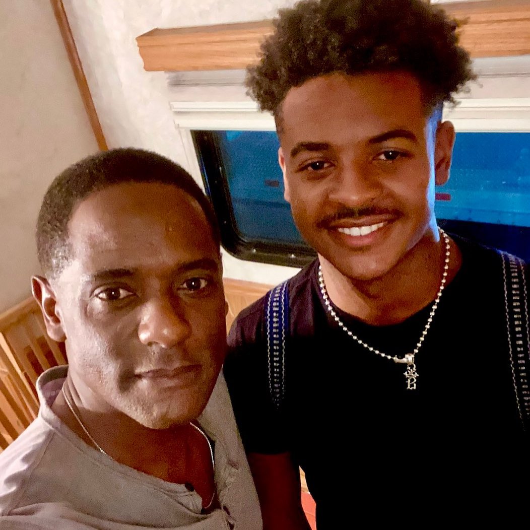Blair Underwood and Blake Underwood pose for a close-up photo, smiling together as their shared features and strong resemblance stand out clearly. | Source: Instagram/blairunderwood_official