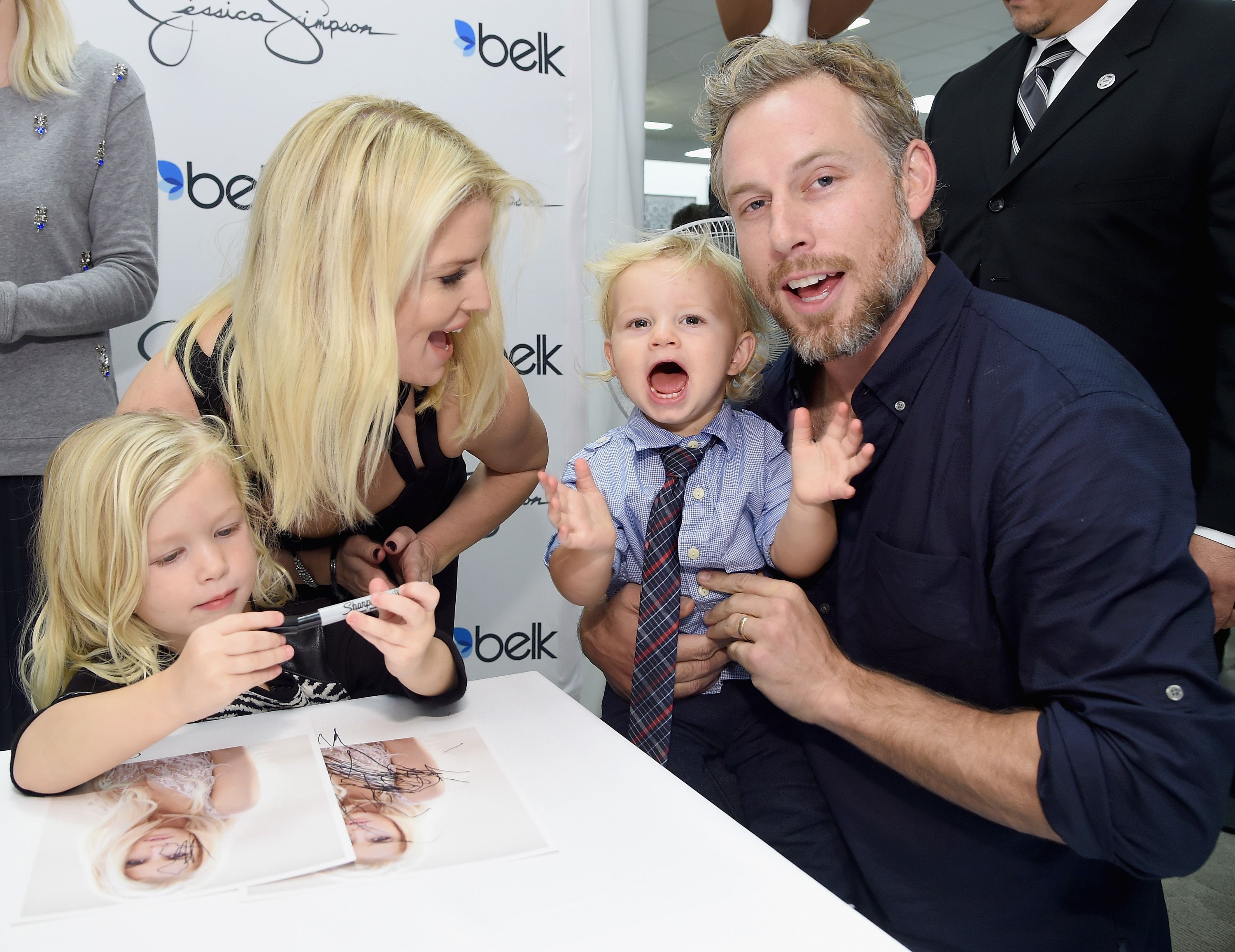 Jessica Simpson, Maxwell Drew, Ace Knute, and Eric Johnson at the Jessica Simpson Collection and the launch of Jessica Simpson Home on November 22, 2014, in Dallas, Texas | Photo: Jamie McCarthy/Getty Images