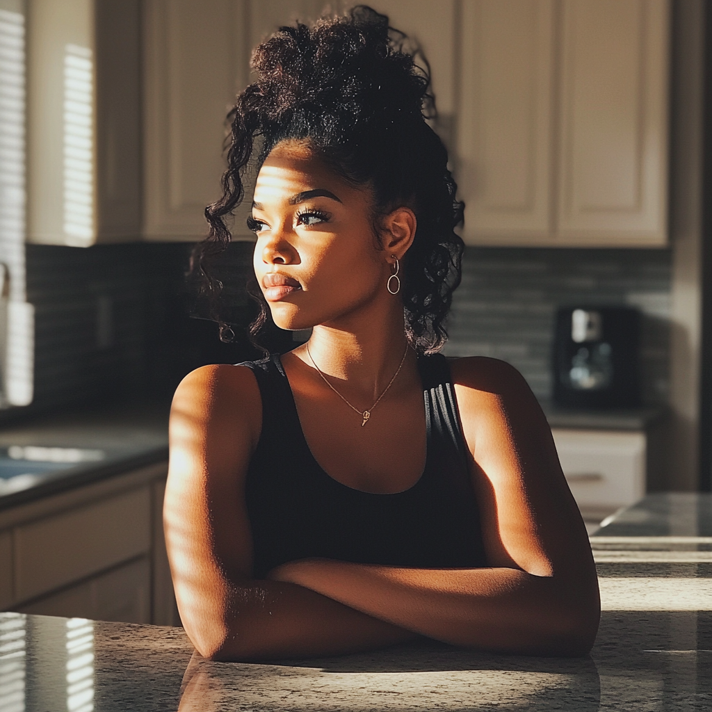 A woman sitting at a kitchen counter | Source: Midjourney