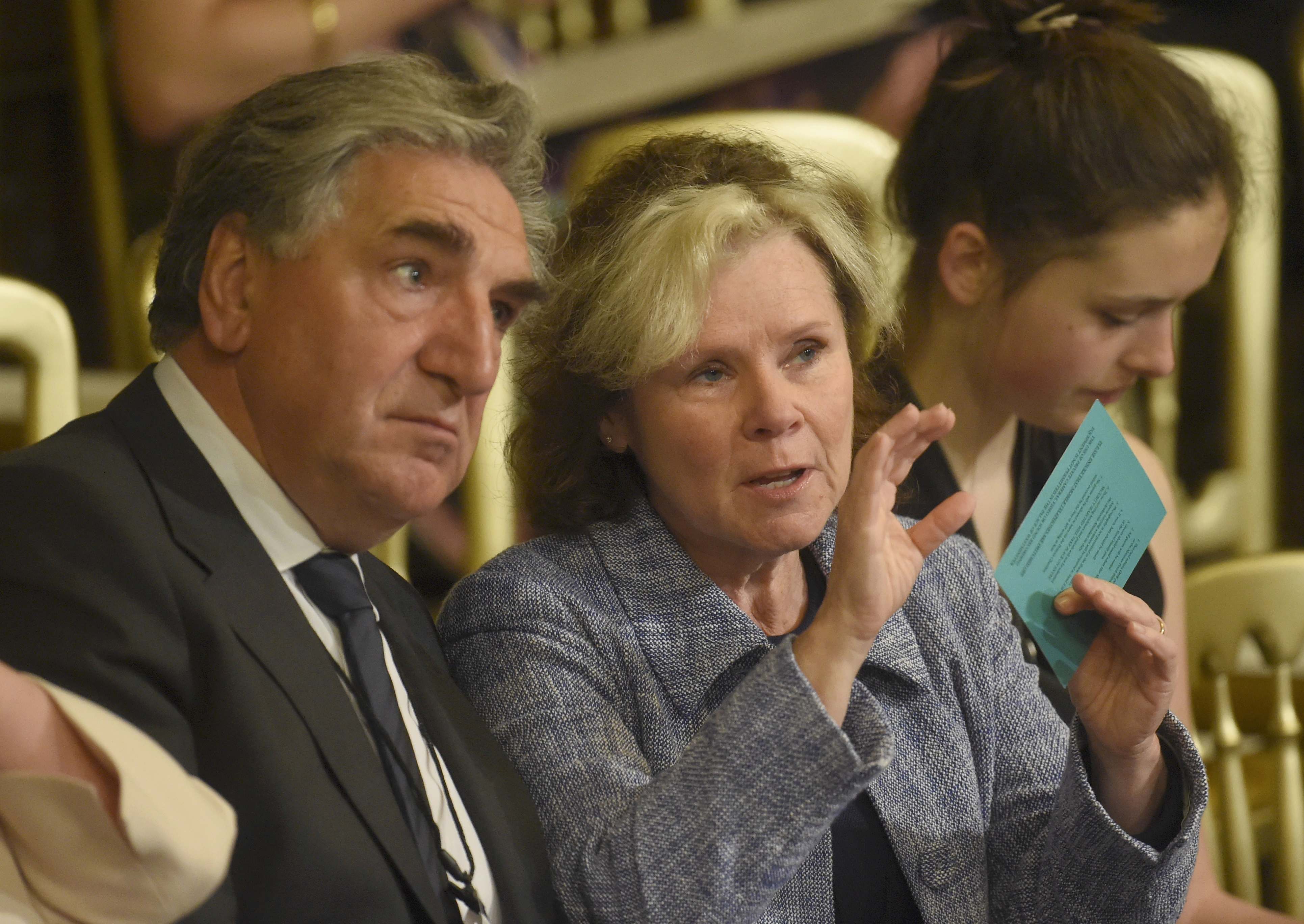 Jim Carter and Imelda Staunton seated before the State Opening of Parliament commenced at the Palace of Westminster at the Houses of Parliament in London, England, on May 18, 2016. | Source: Getty Images