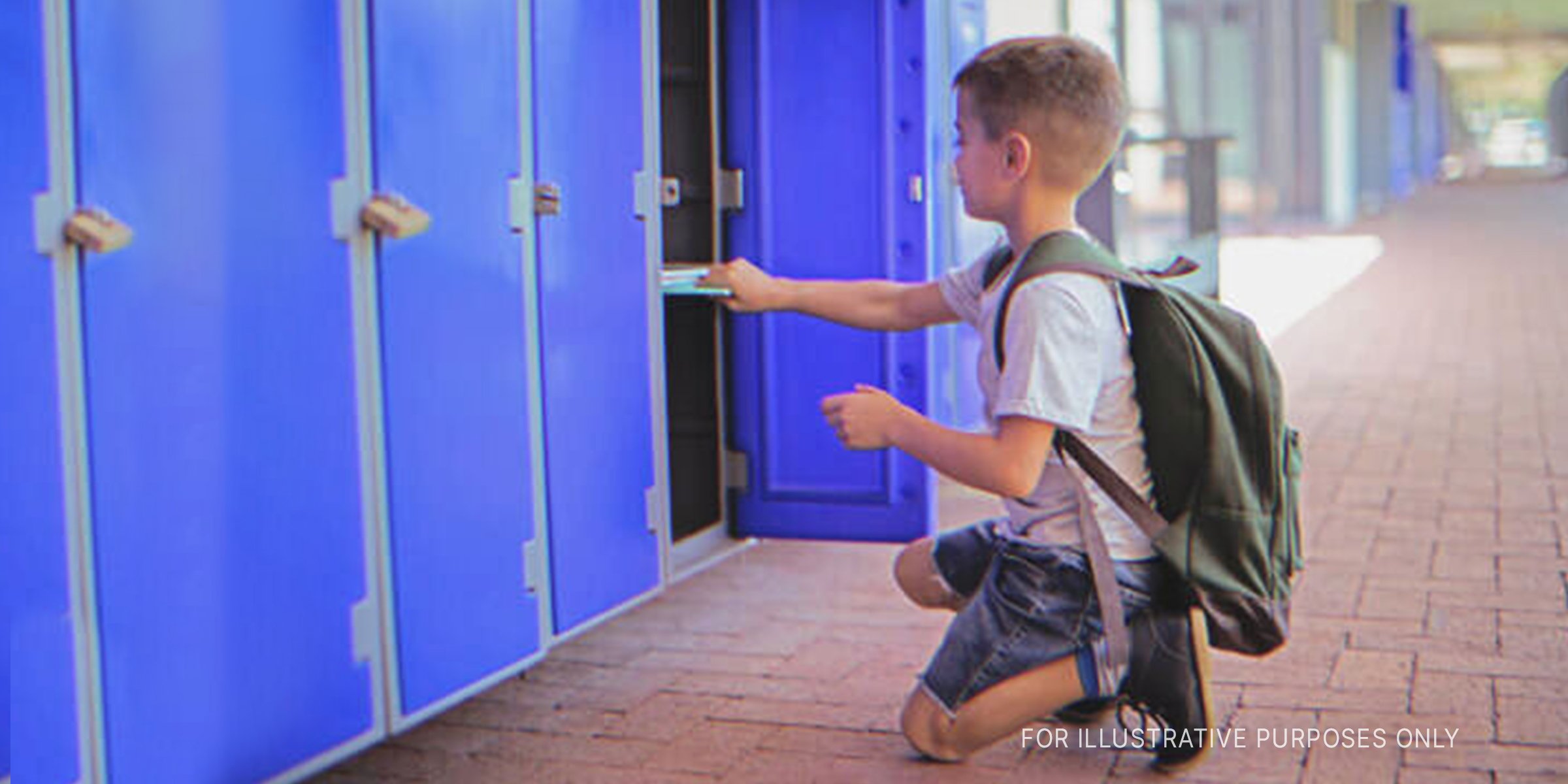 Boy Retrieving Things From His School Locker. | Source: Shutterstock 