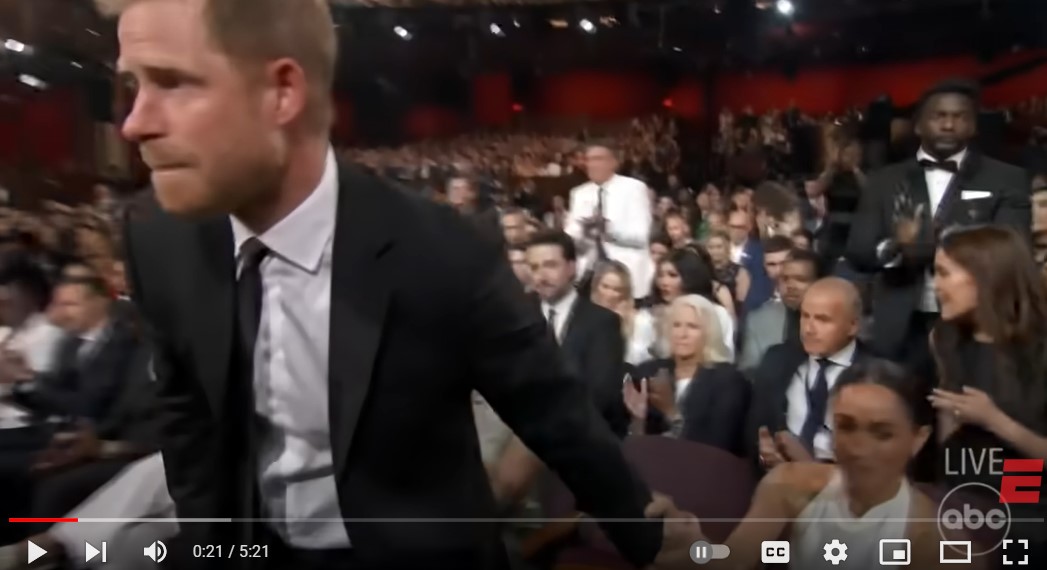 Prince Harry and Meghan touch hands before he walks to the ESPY Award stage to accept the Pat Tillman Award for Service on July 11, 2024, in Hollywood, California | Source: YouTube/ESPN