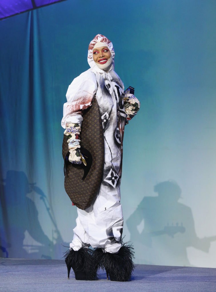 Erykah Badu receives her Soundtrack Award wearing a couture Louis Vuitton hazmat suit during the Austin Film Society's 20th annual Texas Film Awards on March 12, 2020, in Austin, Texas | Source: Gary Miller/Getty Images