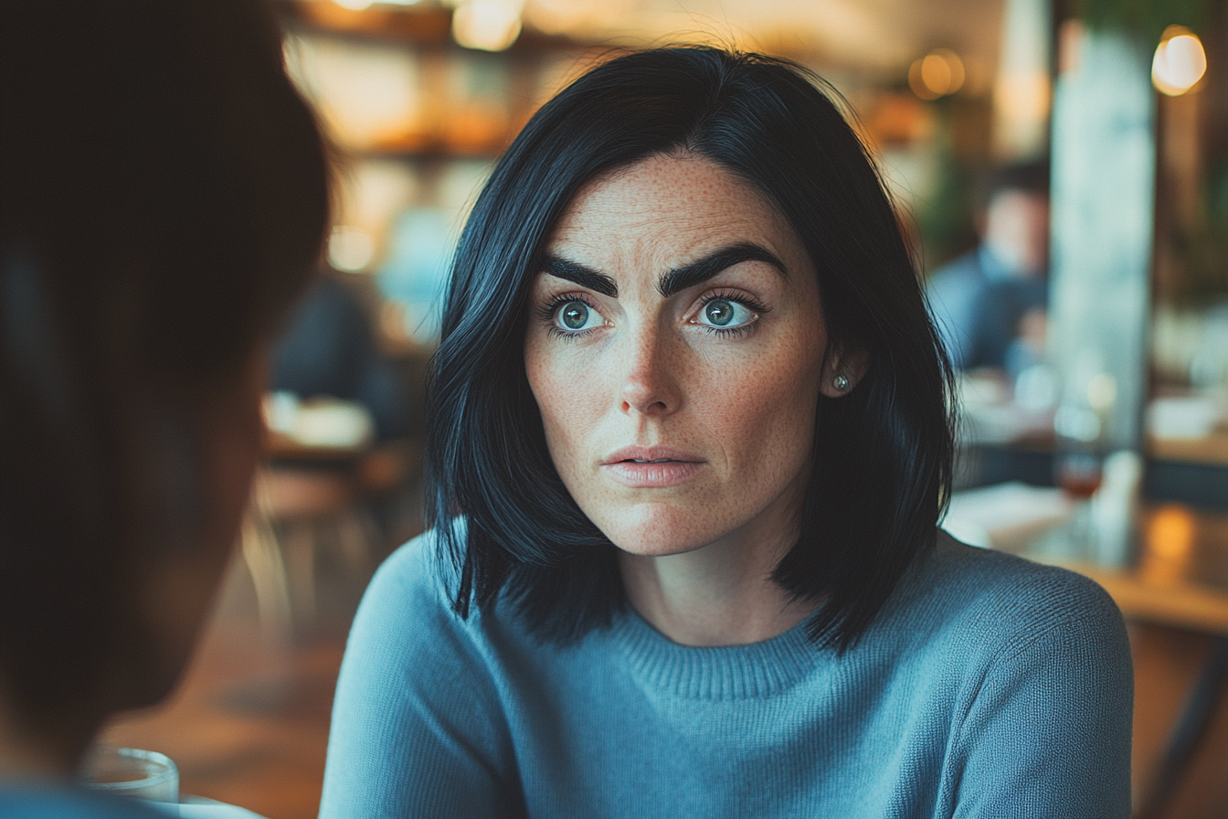 A woman talking to her friend in a restaurant | Source: Midjourney