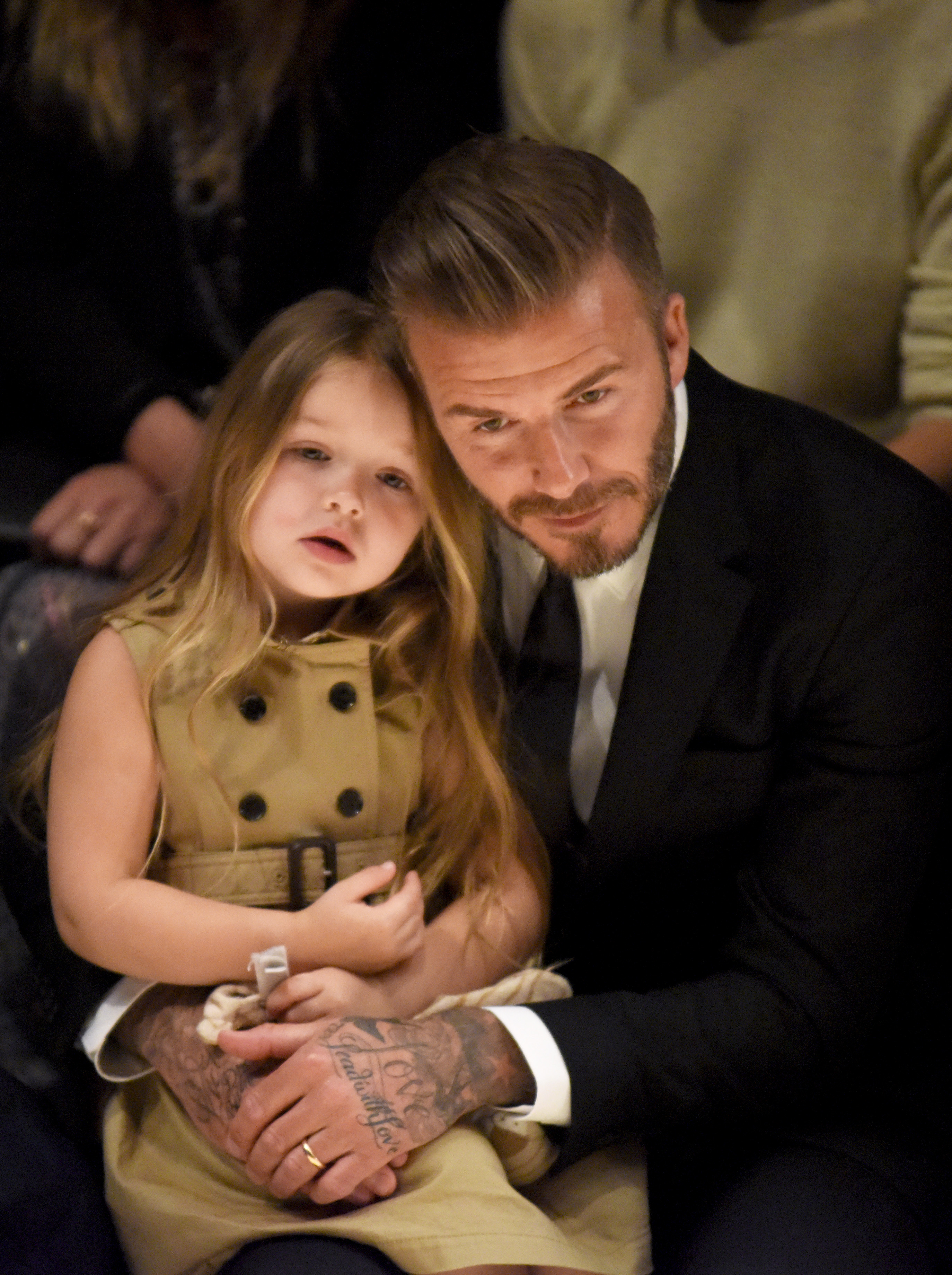 David Beckham with his daughter Harper at the Burberry "London in Los Angeles" event on April 16, 2015, in Los Angeles, California. | Source: Getty Images