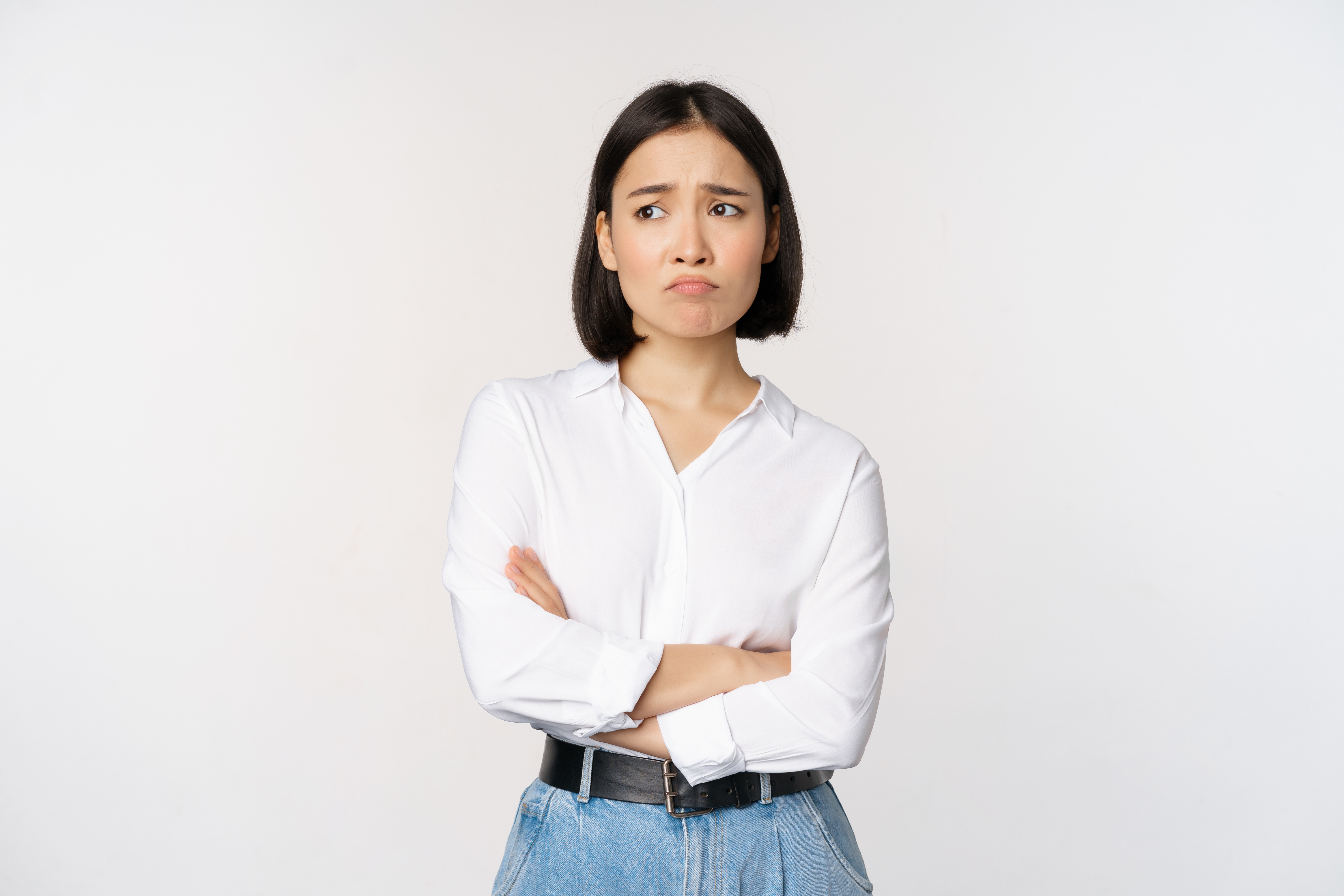 Upset woman with her arms crossed | Source: Shutterstock