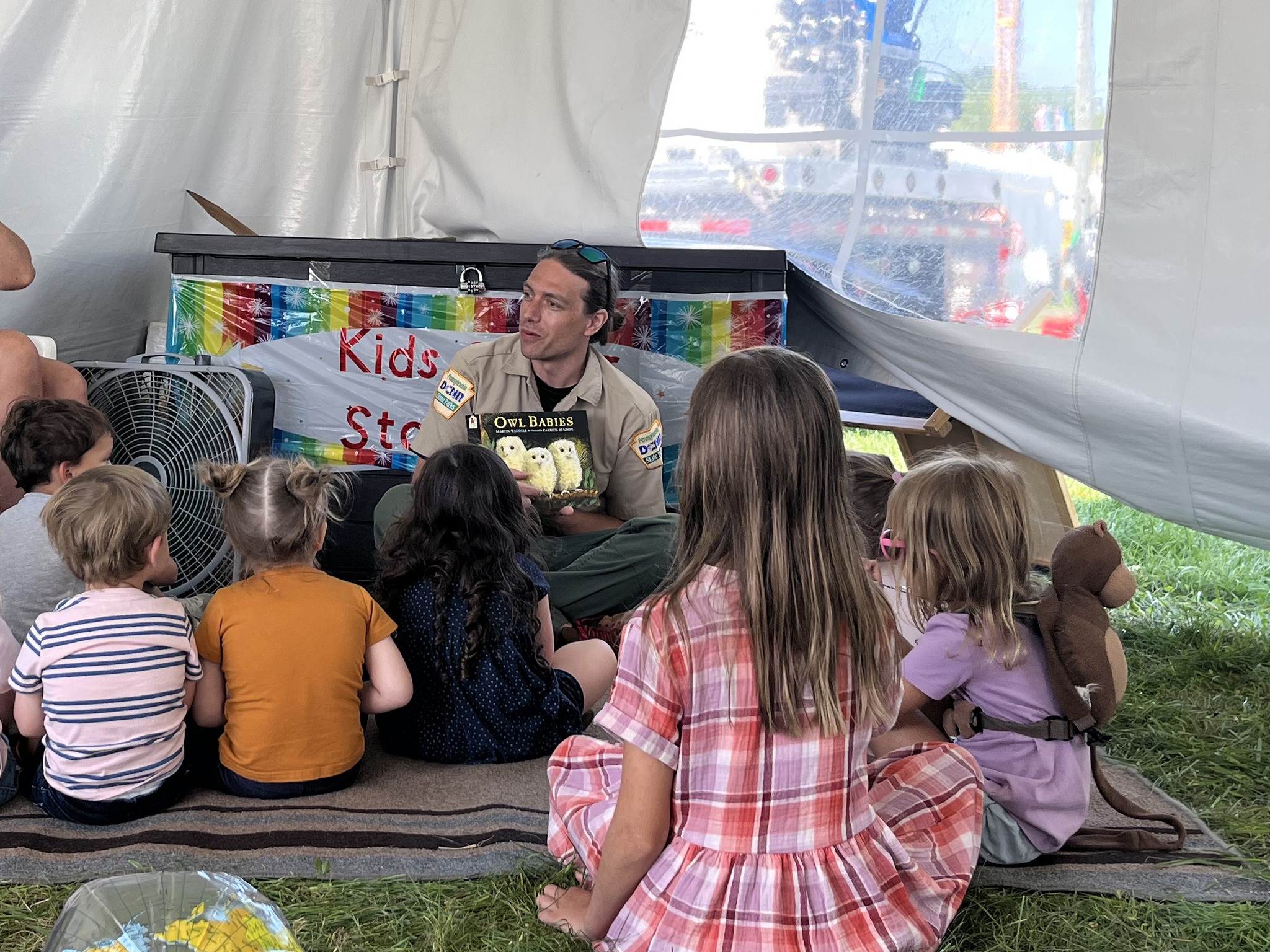 Alec Campbell and interacting with kids, from a post dated May 29, 2025 | Source: Facebook/PaDCNR