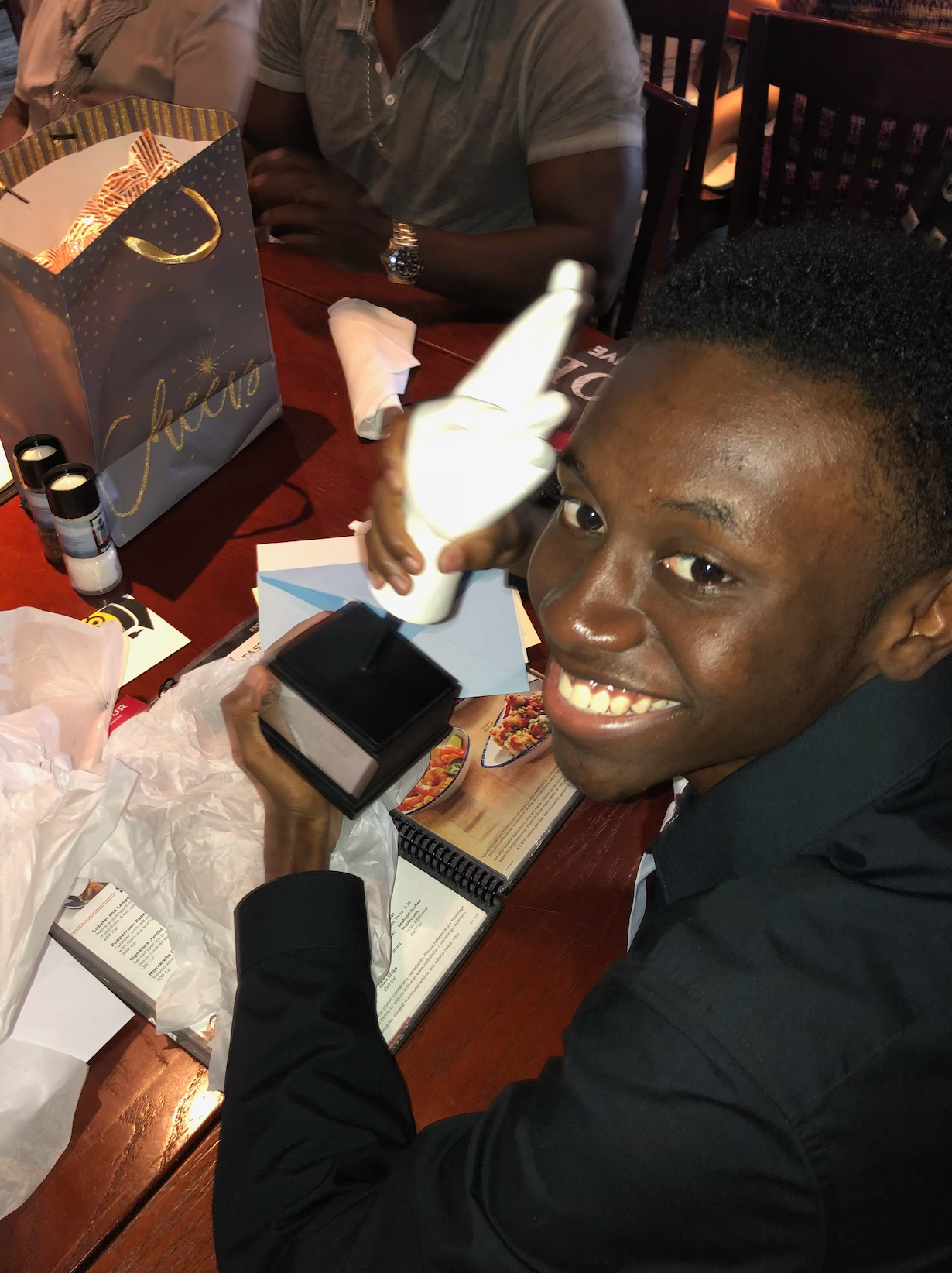 Donovan Metayer holding a trophy | Source: GoFundMe