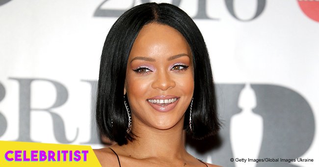 Rihanna shakes her cleavage in yellow & blue bra while showing off new blond hairstyle in video