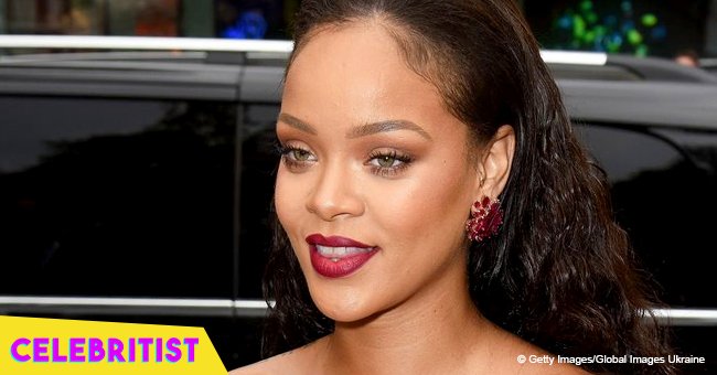 Rihanna steps out in metallic gold gown but suffers wardrobe malfunction