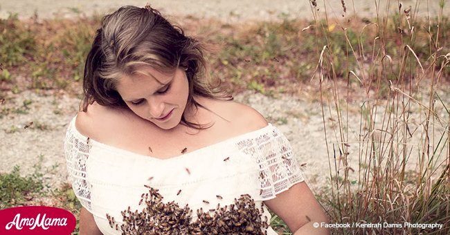 Pregnant woman poses with 20,000 bees since losing her first child after a similar photo shoot