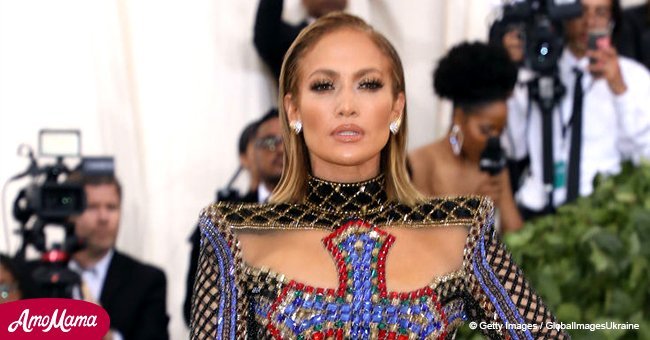 Jennifer Lopez dons glittering dress with huge cross on her chest