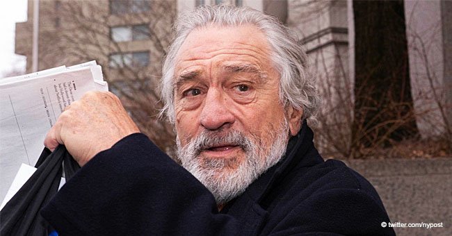 Robert De Niro reportedly hides behind a newspaper shouting at his driver outside divorce court