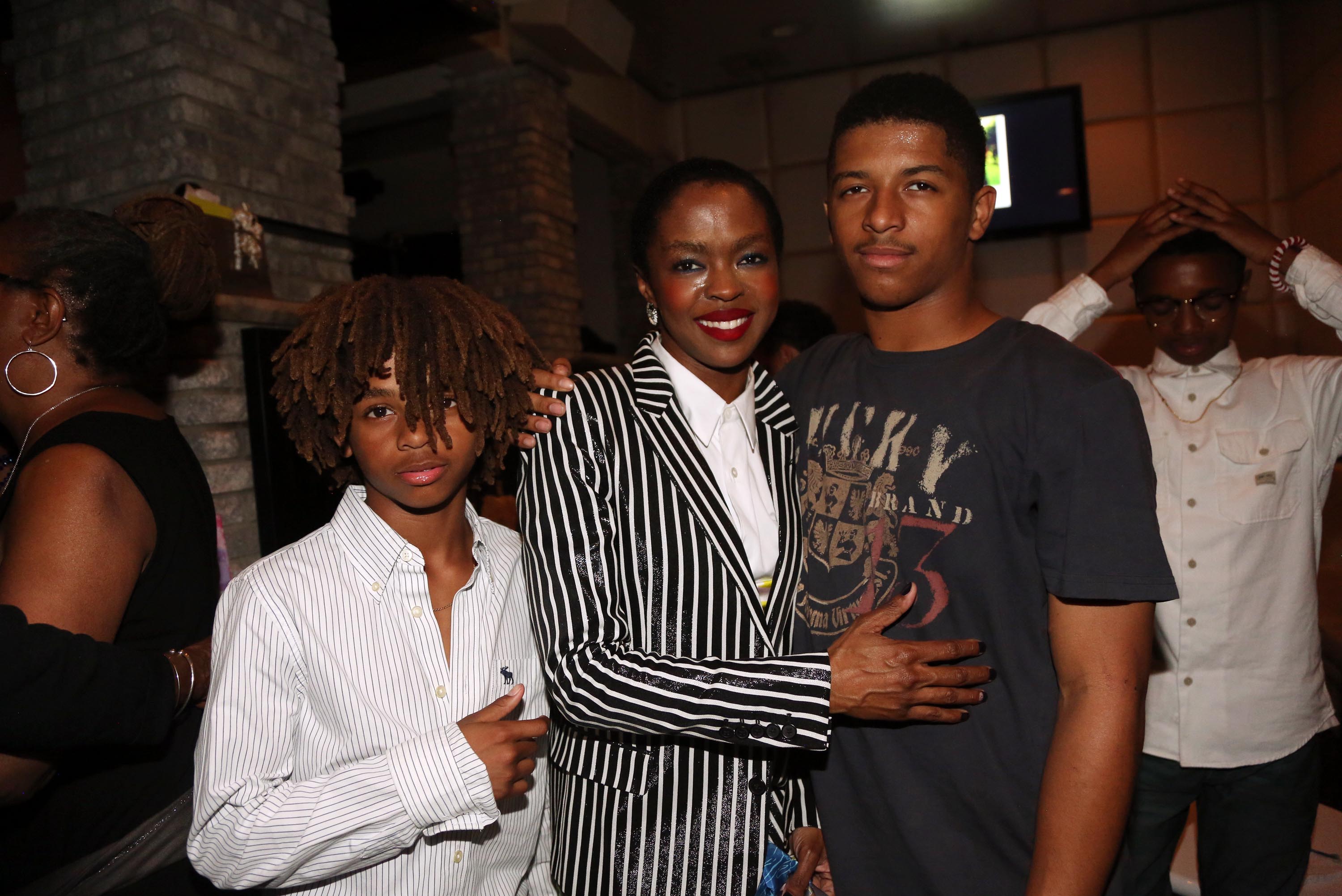 Lauryn Hill (C) with her sons John Marley (L) and Zion Marley (R) at The Ballroom on May 26, 2015, in West Orange, New Jersey. | Source: Getty Images