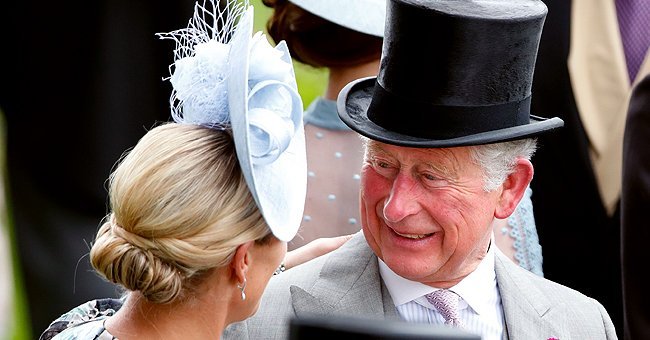 Zara Tindall embraces Prince Charles, Prince of Wales as they attend day one of Royal Ascot at Ascot Racecourse on June 18, 2019 in Ascot, England | Photo: Getty Images