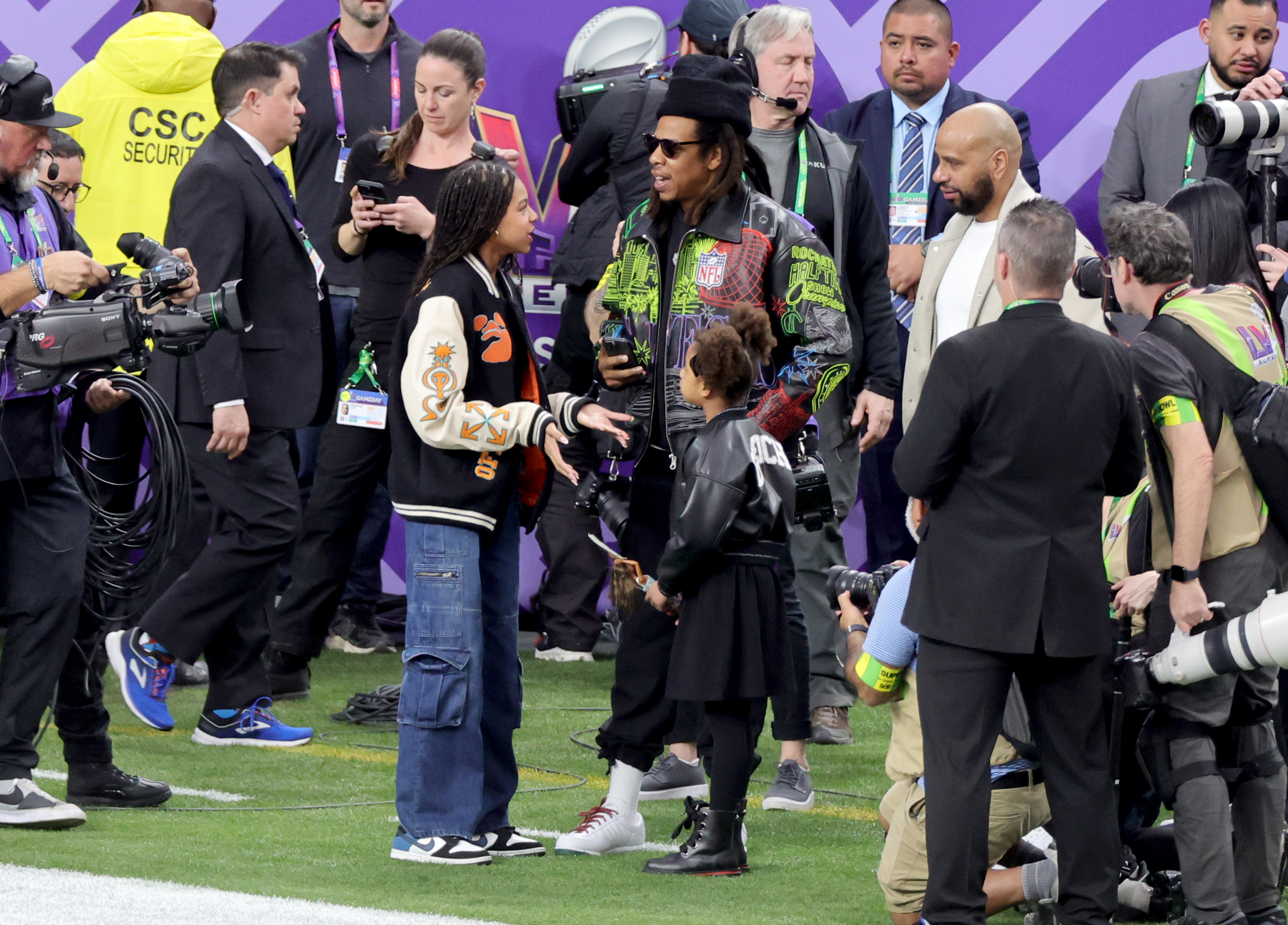 Jay-Z with daughters Blue Ivy and Rumi Carter seen prior to Super Bowl LVIII between the against the San Francisco 49ers and Kansas City Chiefs on February 11, 2024 in Las Vegas, Nevada | Source: Getty Images