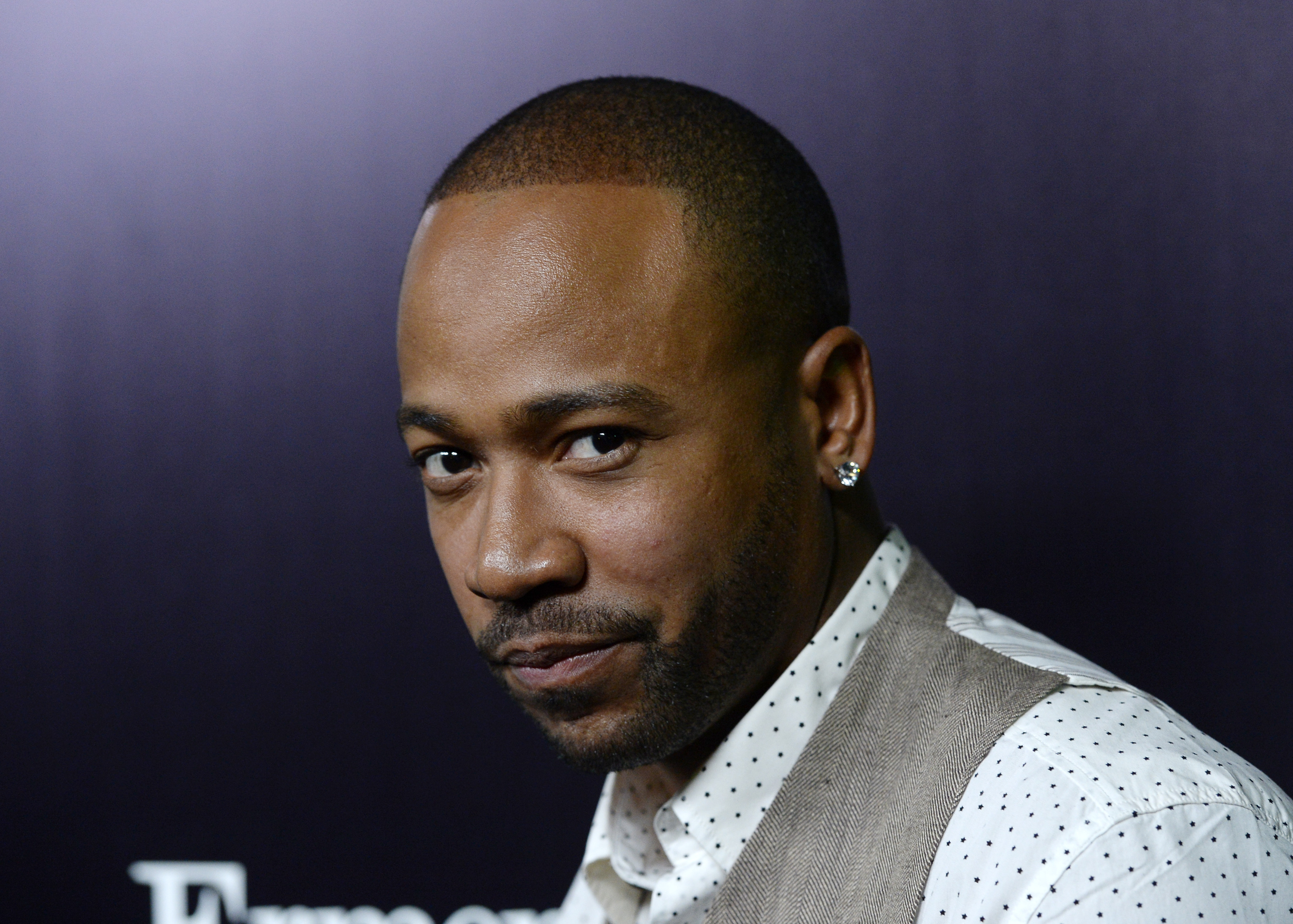 Columbus Short arrives to the Ermenegildo Zegna Global Store Opening on November 7, 2013 | Source: Getty Images