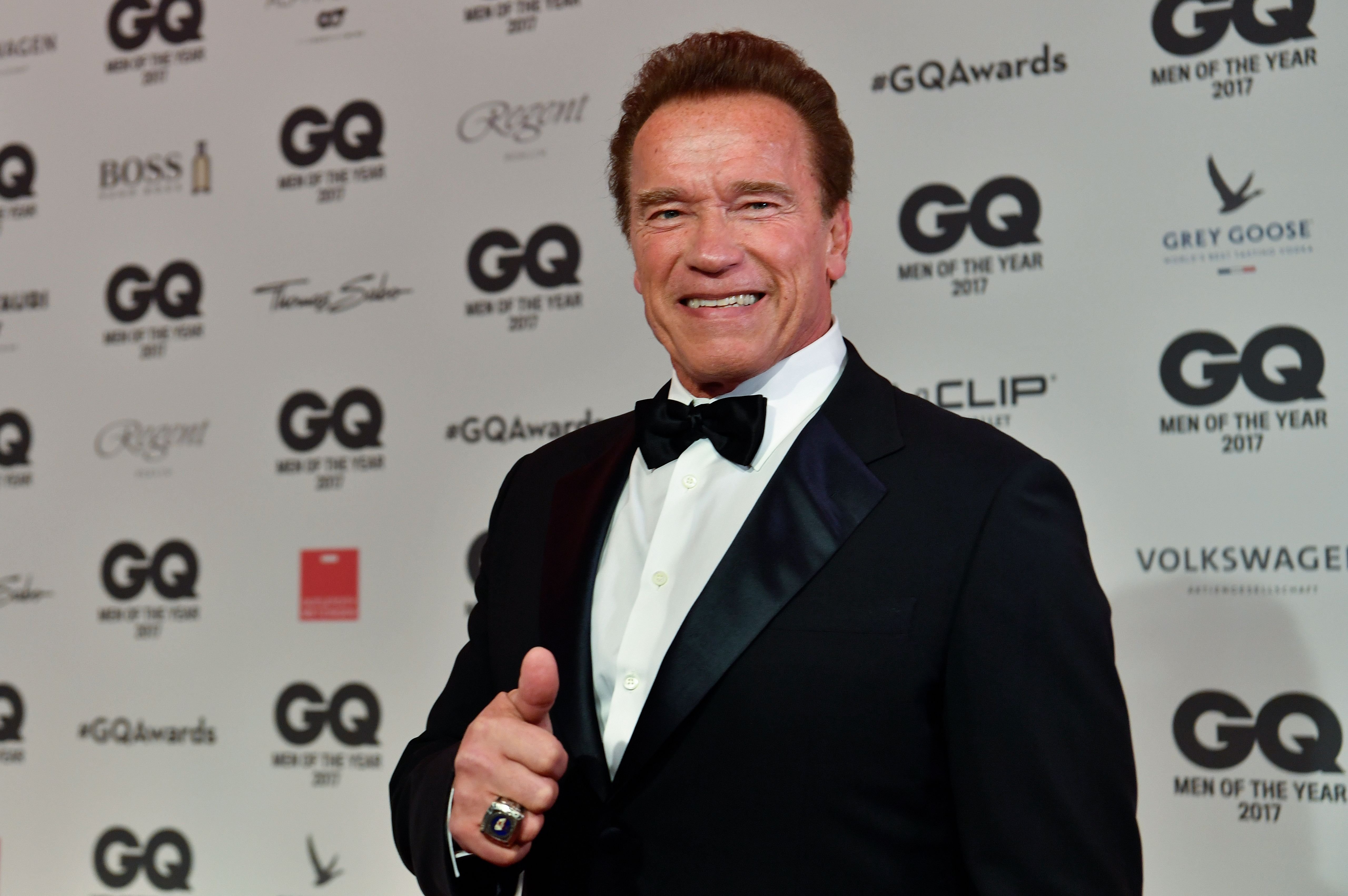 Actor and former California governor Arnold Schwarzenegger poses on the red carpet as he arrives for the GQ "Men Of The Year" awards ceremony in Berlin where he will be honoured as "Legend of the Century" on November 9, 2017 | Source: Getty Images