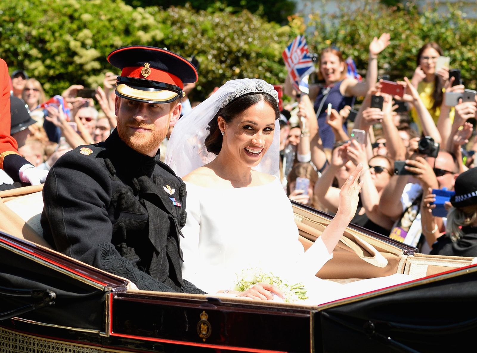 Prince Harry and Meghan Markle after getting married at St Georges Chapel on May 19, 2018 in Windsor, England | Photo: Getty Images