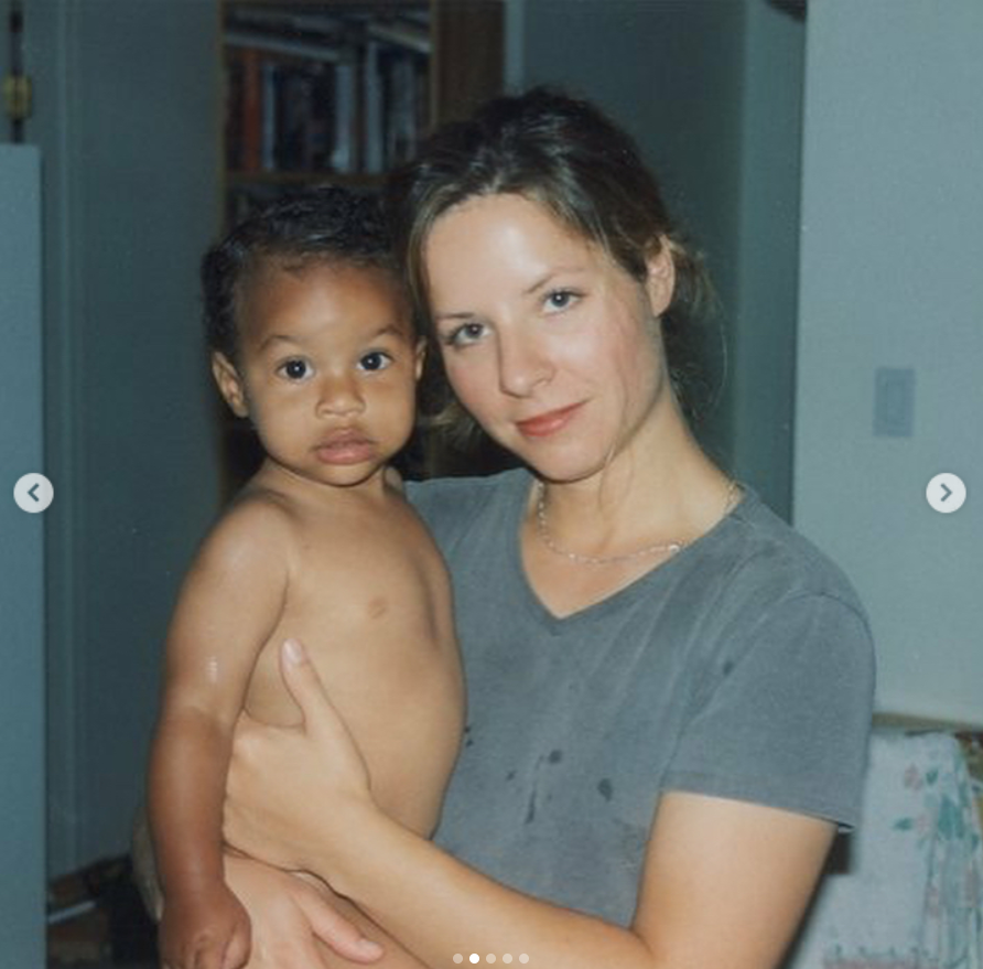 Whitney Triplett holds a young Brandon Clarke in a childhood throwback photo taken inside a home. | Source: Instagram/brandon_clarke23