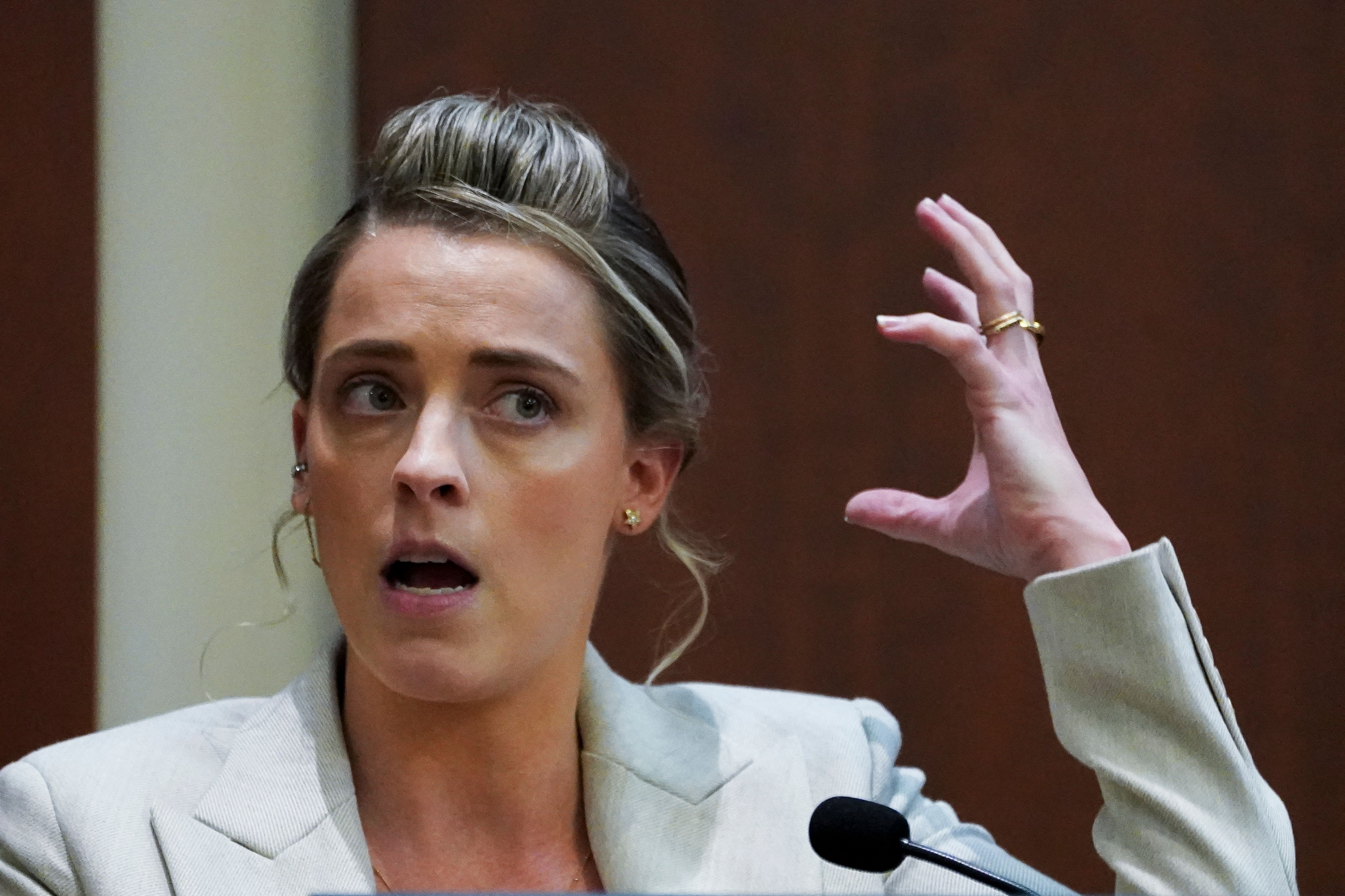 Amber Heard's sister, Whitney Henriquez, testifies on the stand during Johnny Depp's defamation trial against ex-wife Amber Heard at the Fairfax County Circuit Courthouse on May 18, 2022 in Fairfax. / Source: Getty Images