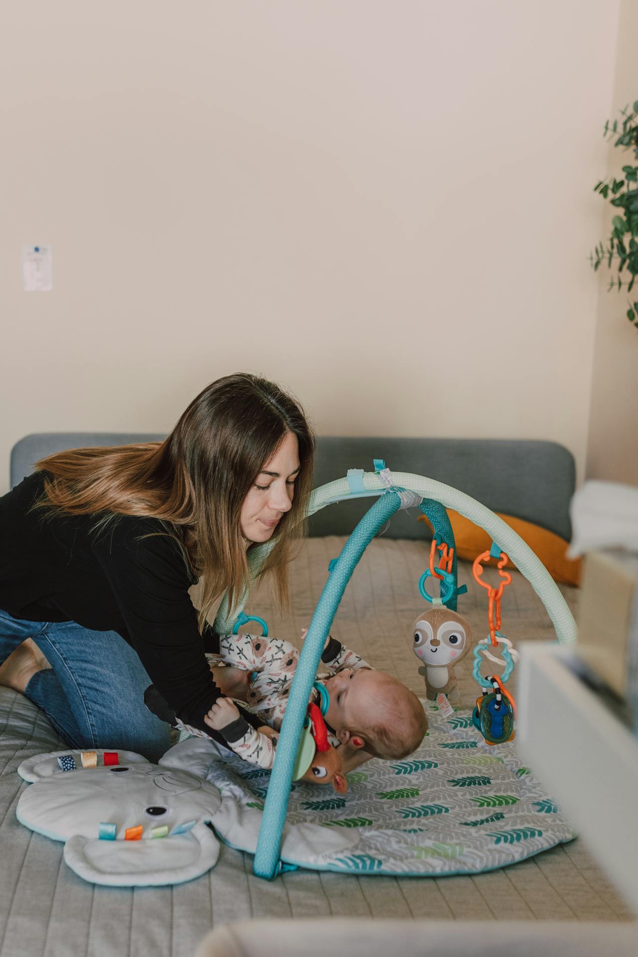 A woman holding her baby | Source: Pexels
