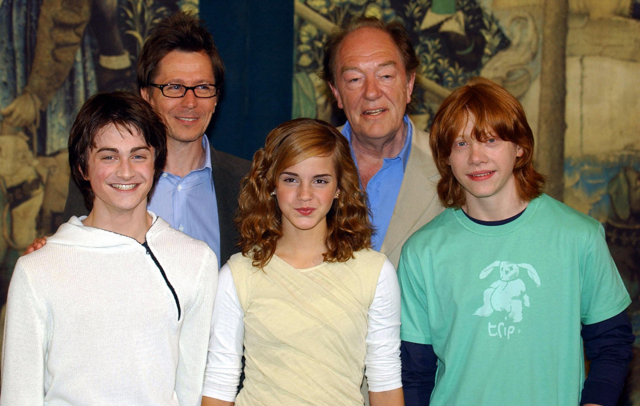 Daniel Radcliffe, Gary Oldman, Emma Watson, Sir Michael Gambon, and Rupert Grint at the photo call for "Harry Potter and the Prisoner of Azkaban" in London England on May 27, 2004 | Source: Getty Images