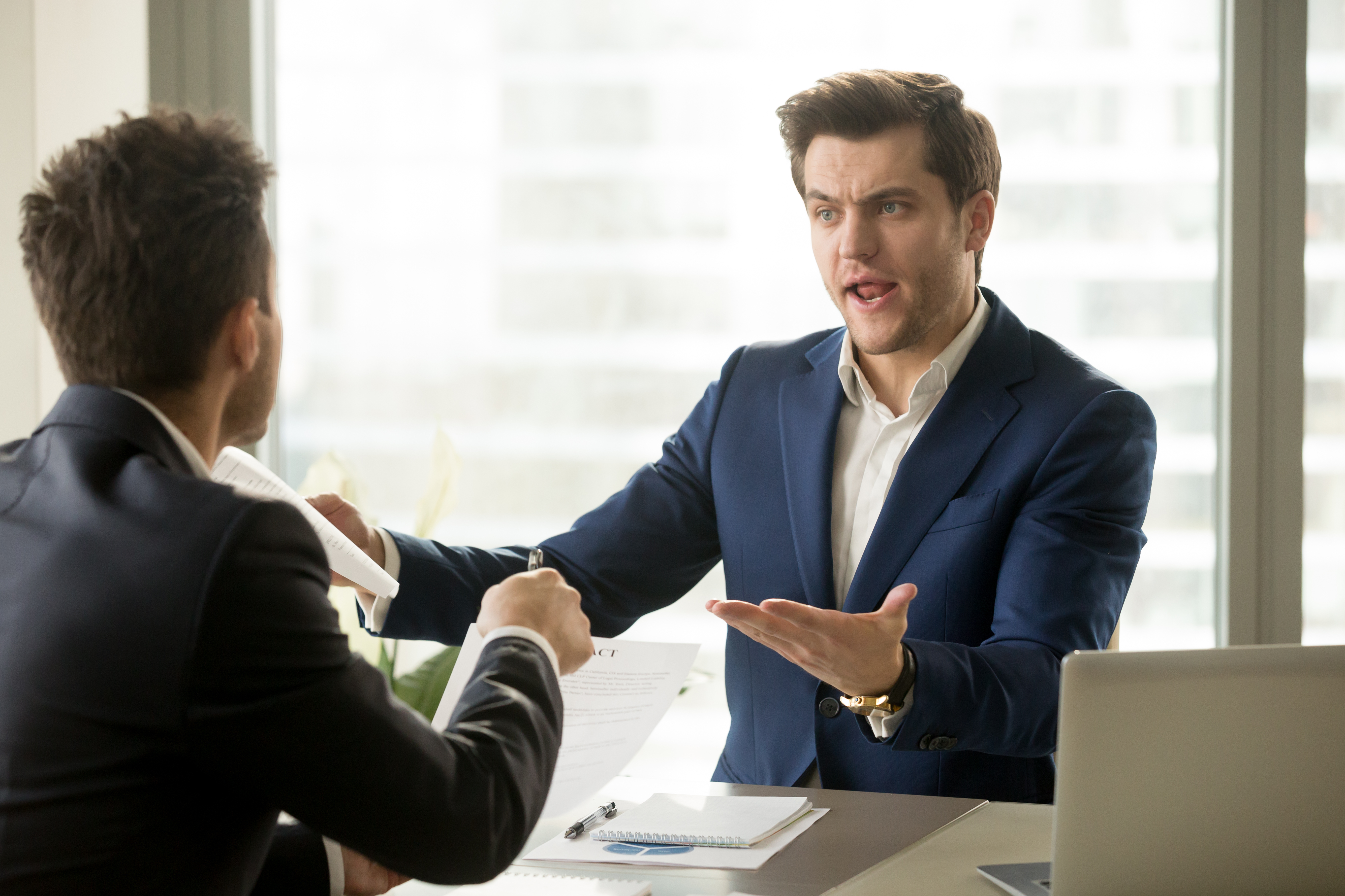 Two men having an argument | Source: Shutterstock