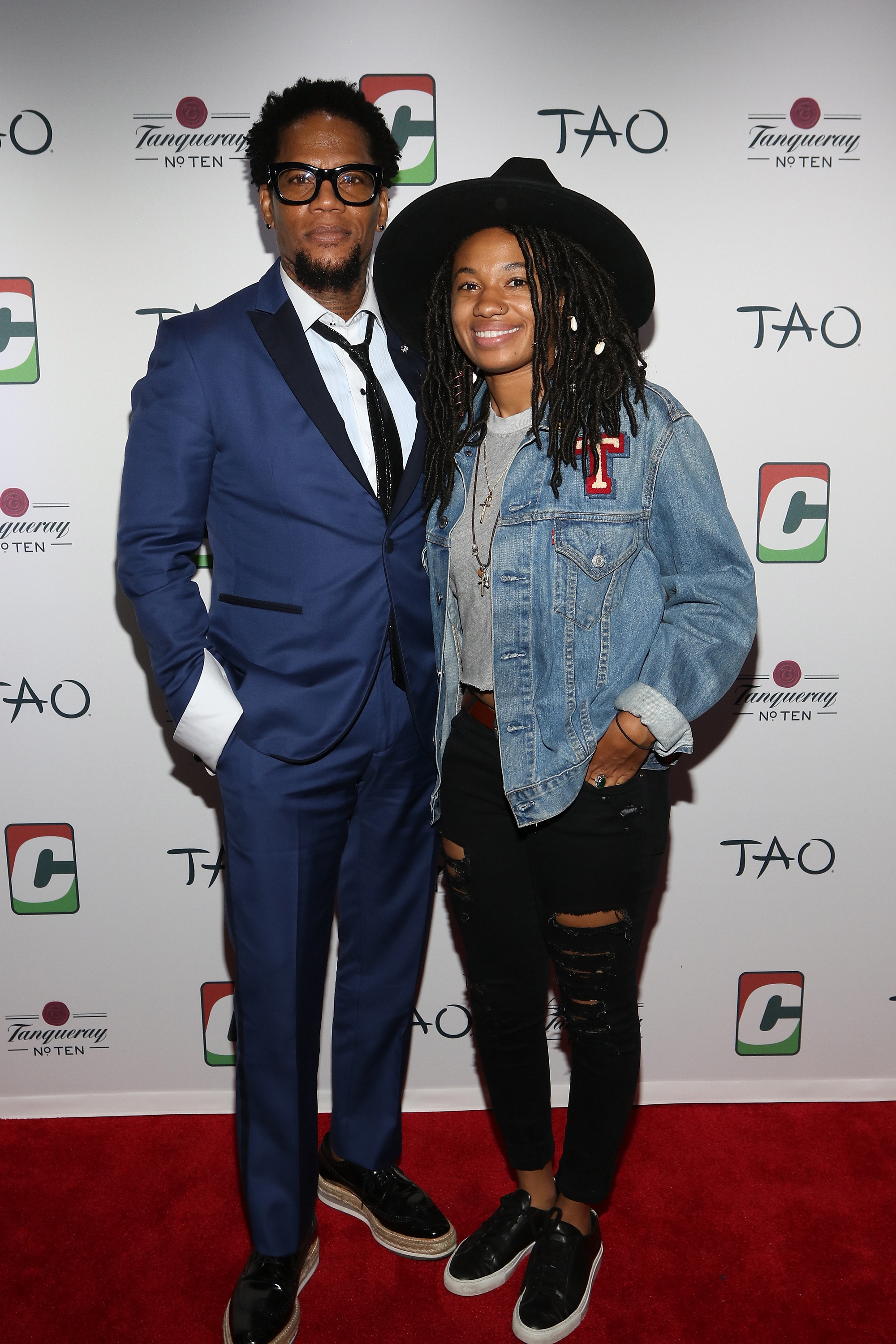 D. L. Hughley and Tyler Hughley attend Dave Chappelle Birthday Celebration at TAO Uptown, on August 24, 2017, in New York City. | Source: Getty Images
