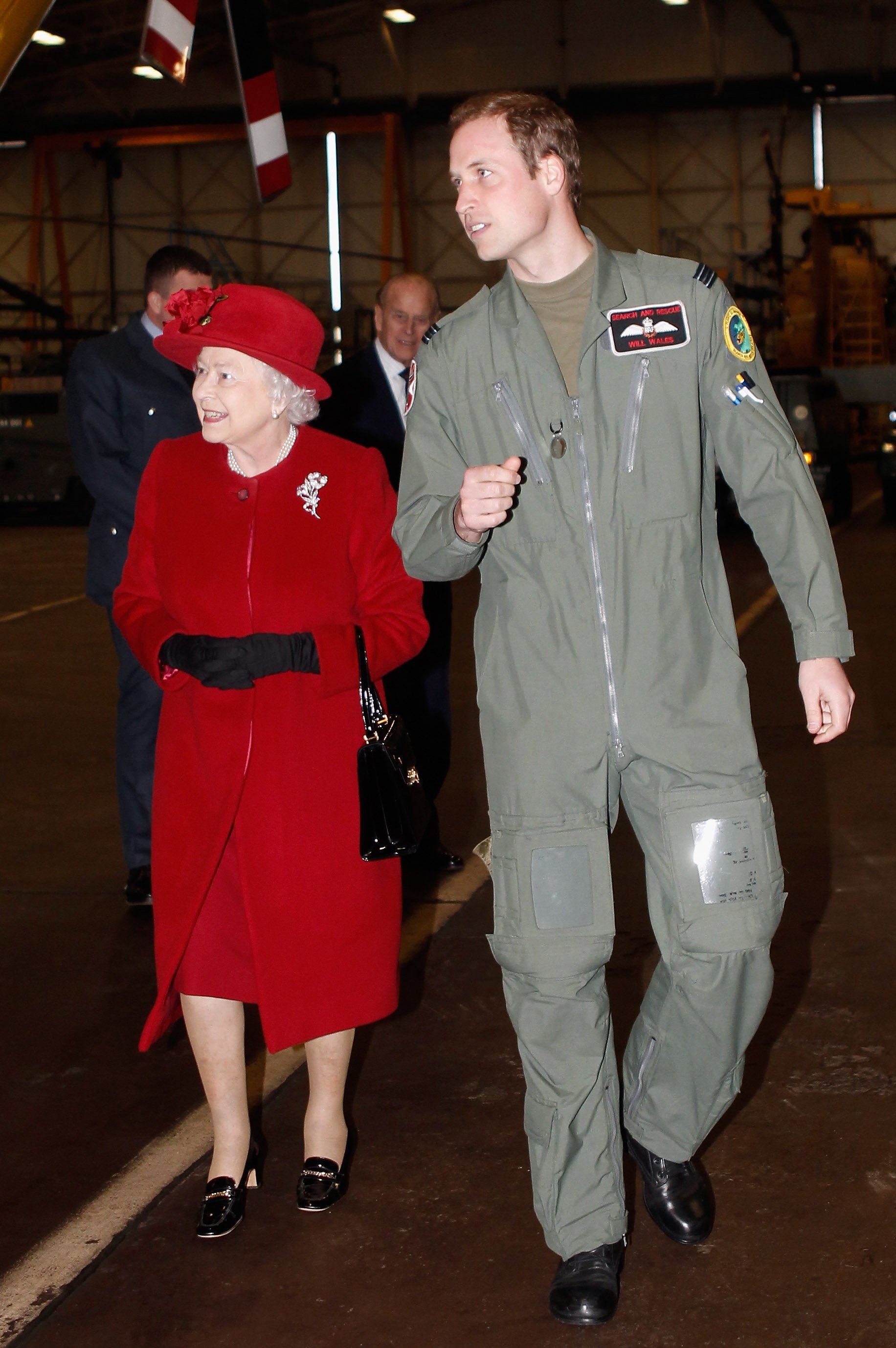 Queen Elizabeth II and Prince William during a visit to RAF Valley on April 1, 2011 in Holyhead, United Kingdom | Source: Getty Images