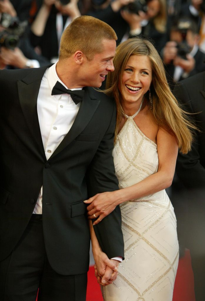 Brad Pitt and Jennifer Aniston during the World Premiere of epic movie "Troy" at Le Palais de Festival on May 13, 2004 in Cannes, France. | Source: Getty Images