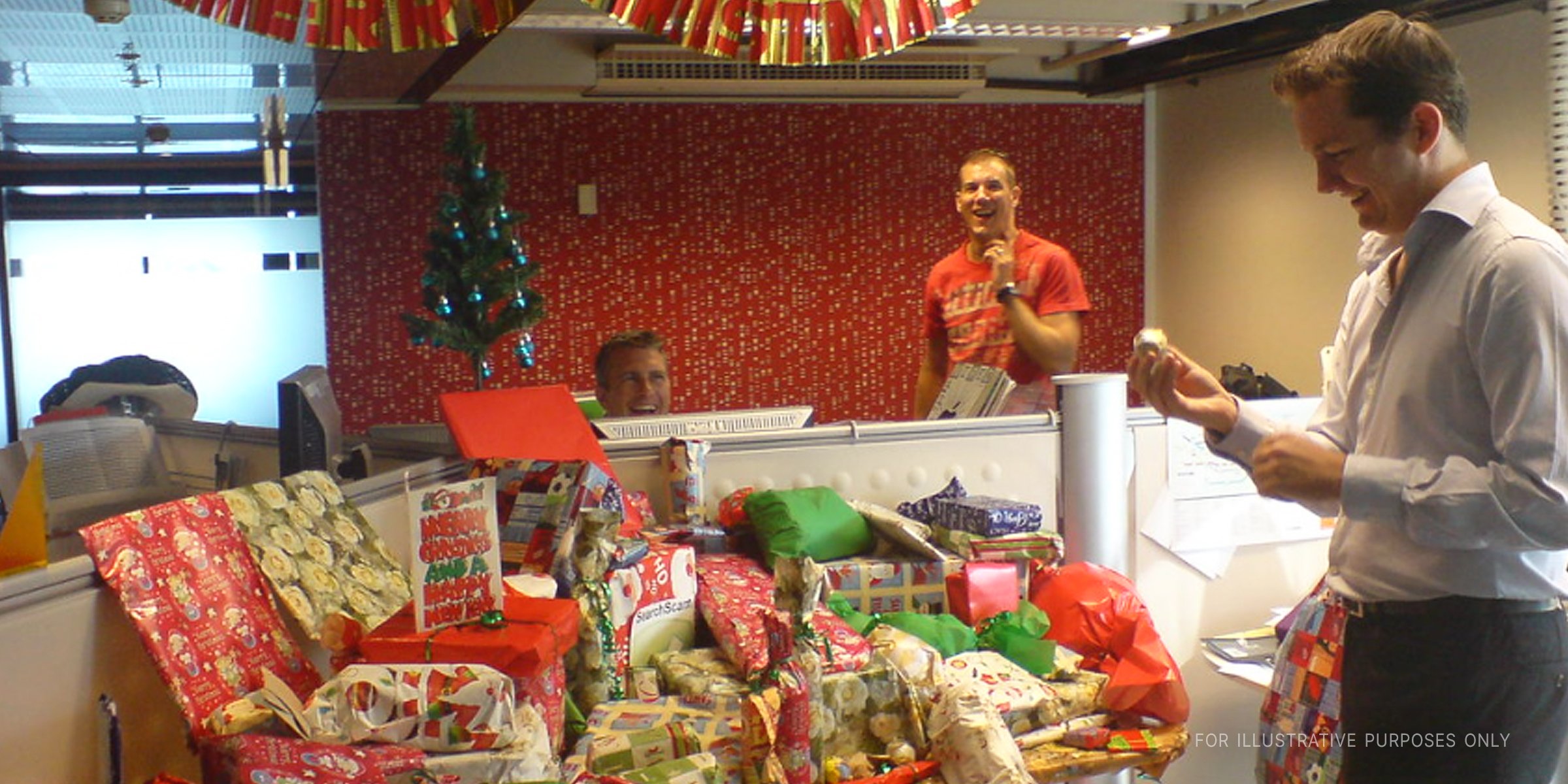 Man contemplating many christmas presents on a desk | Source: Flickr/AussieGold (CC BY 2.0)