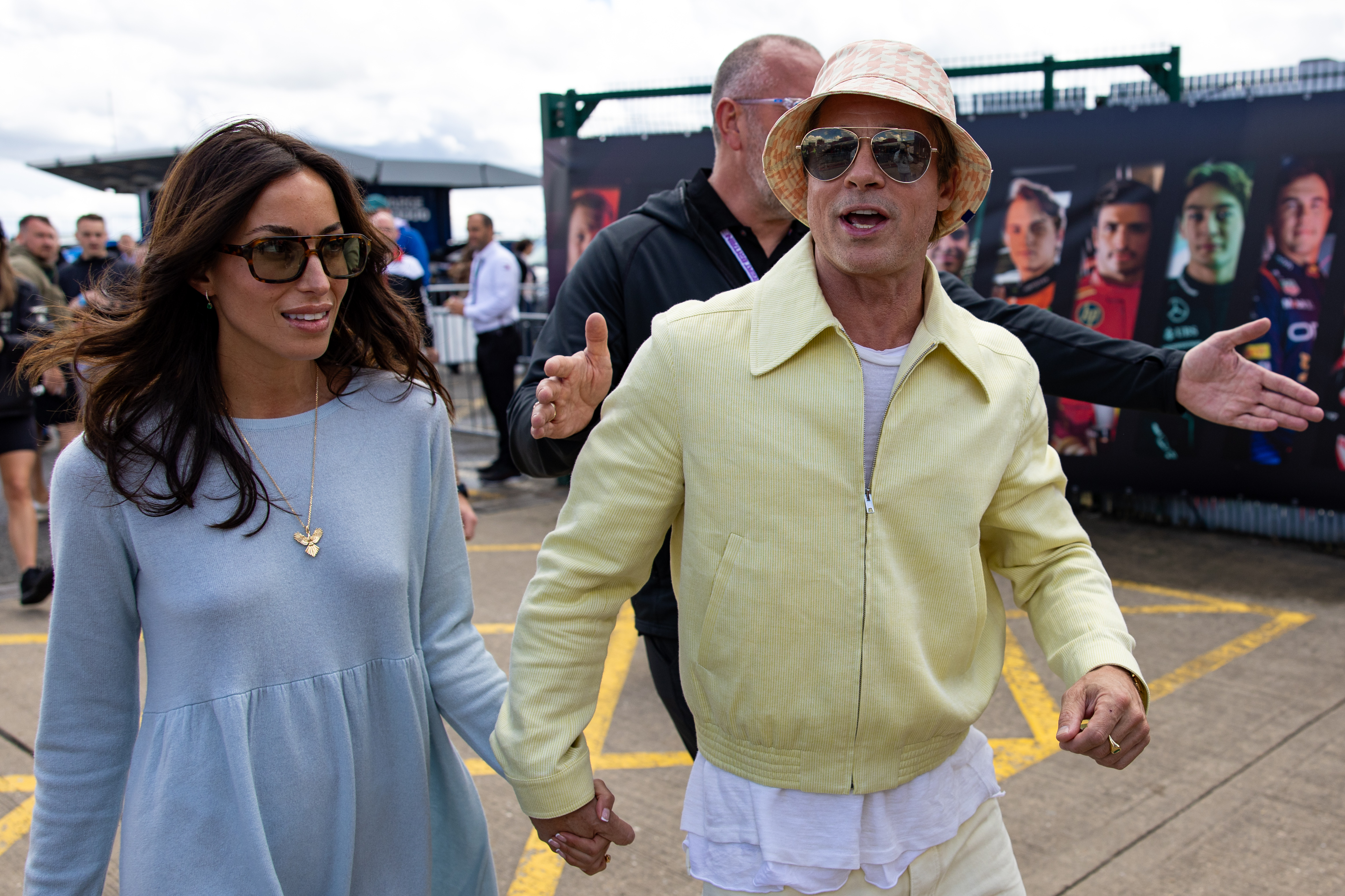 Ines de Ramon and Brad Pitt at the F1 Grand Prix of Great Britain in Northampton, United Kingdom on July 7, 2024 | Source: Getty Images