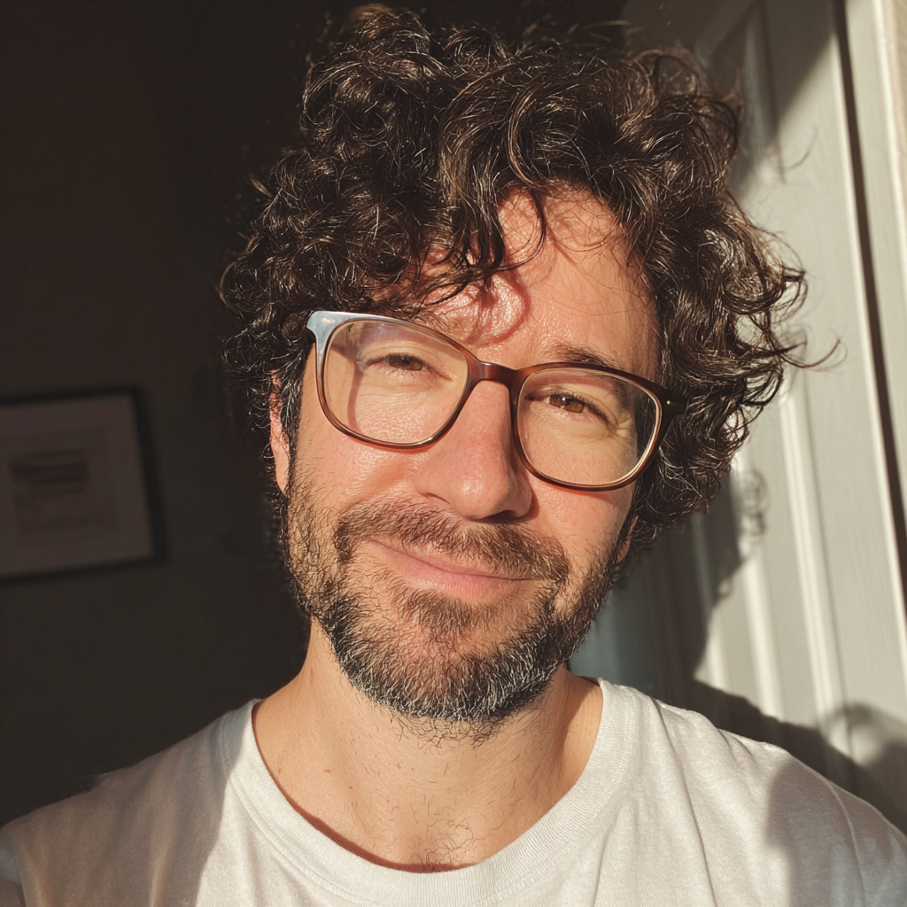 A smiling and emotional man standing by the front door | Source: Midjourney