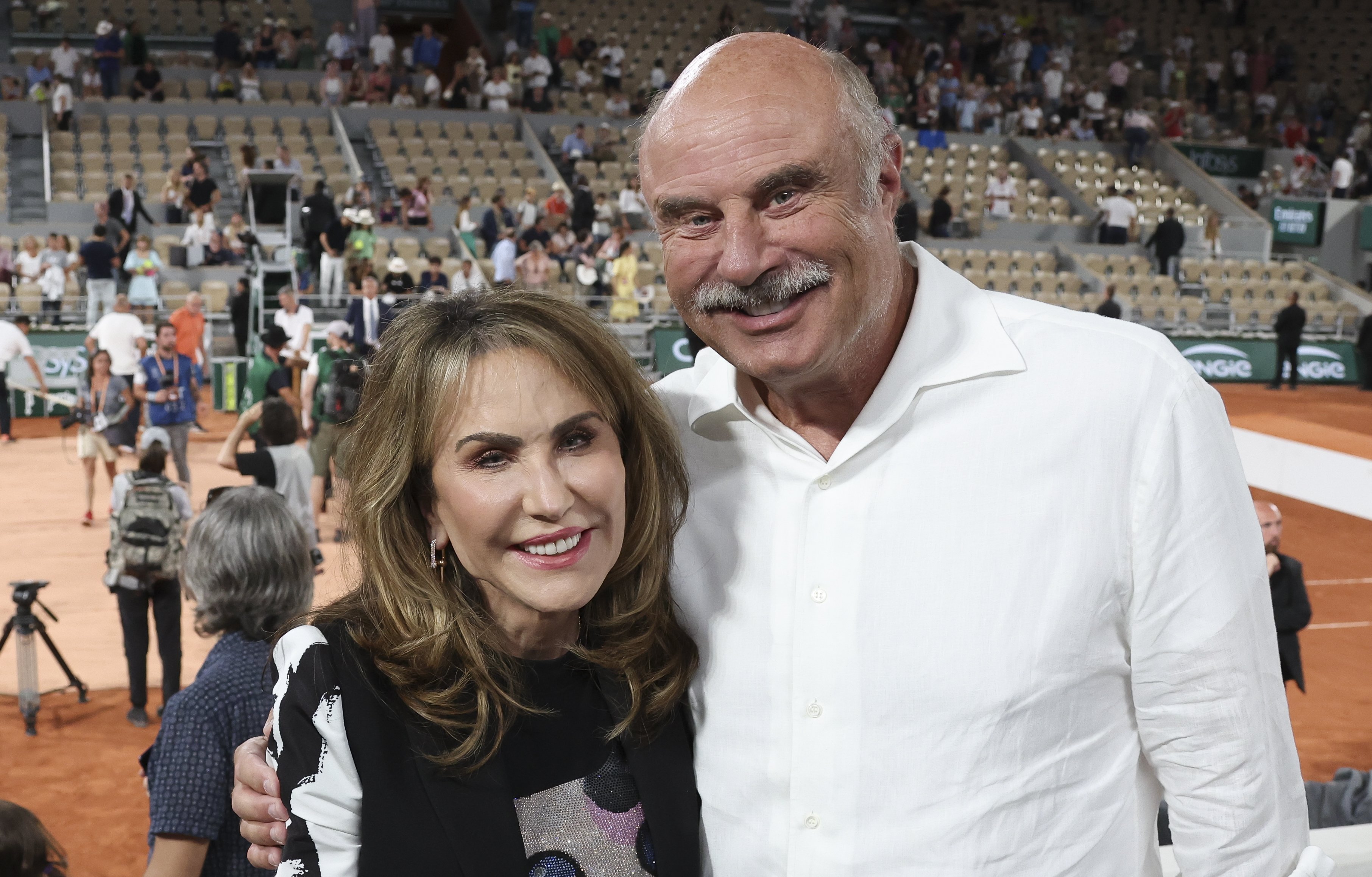 Dr. Phil aka Phil McGraw and his wife Robin McGraw attends the women's final on day 14 of the French Open 2022 held at Stade Roland Garros on June 4, 2022 in Paris, France. | Source: Getty Images