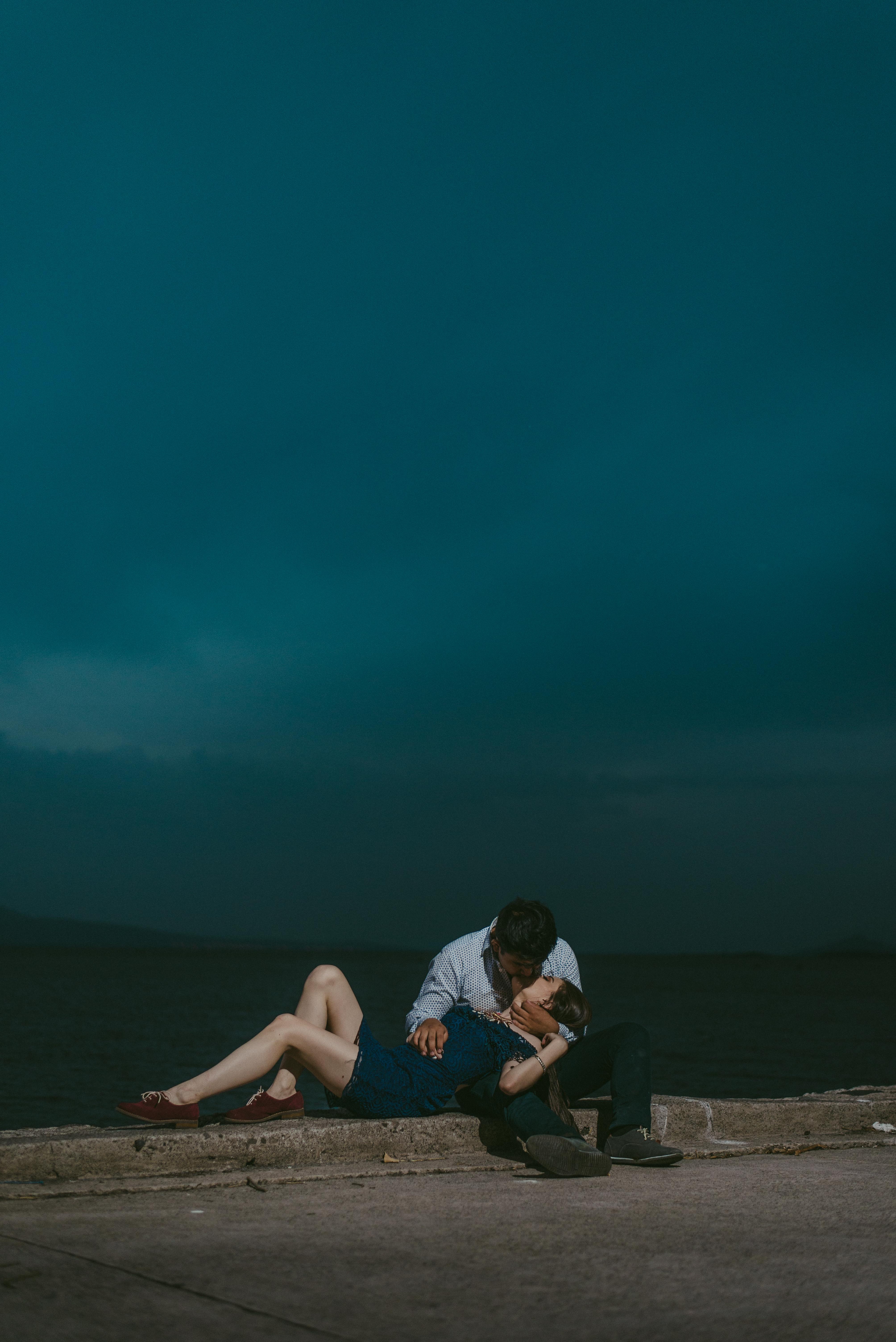 Two individuals kissing│ Source: Unsplash
