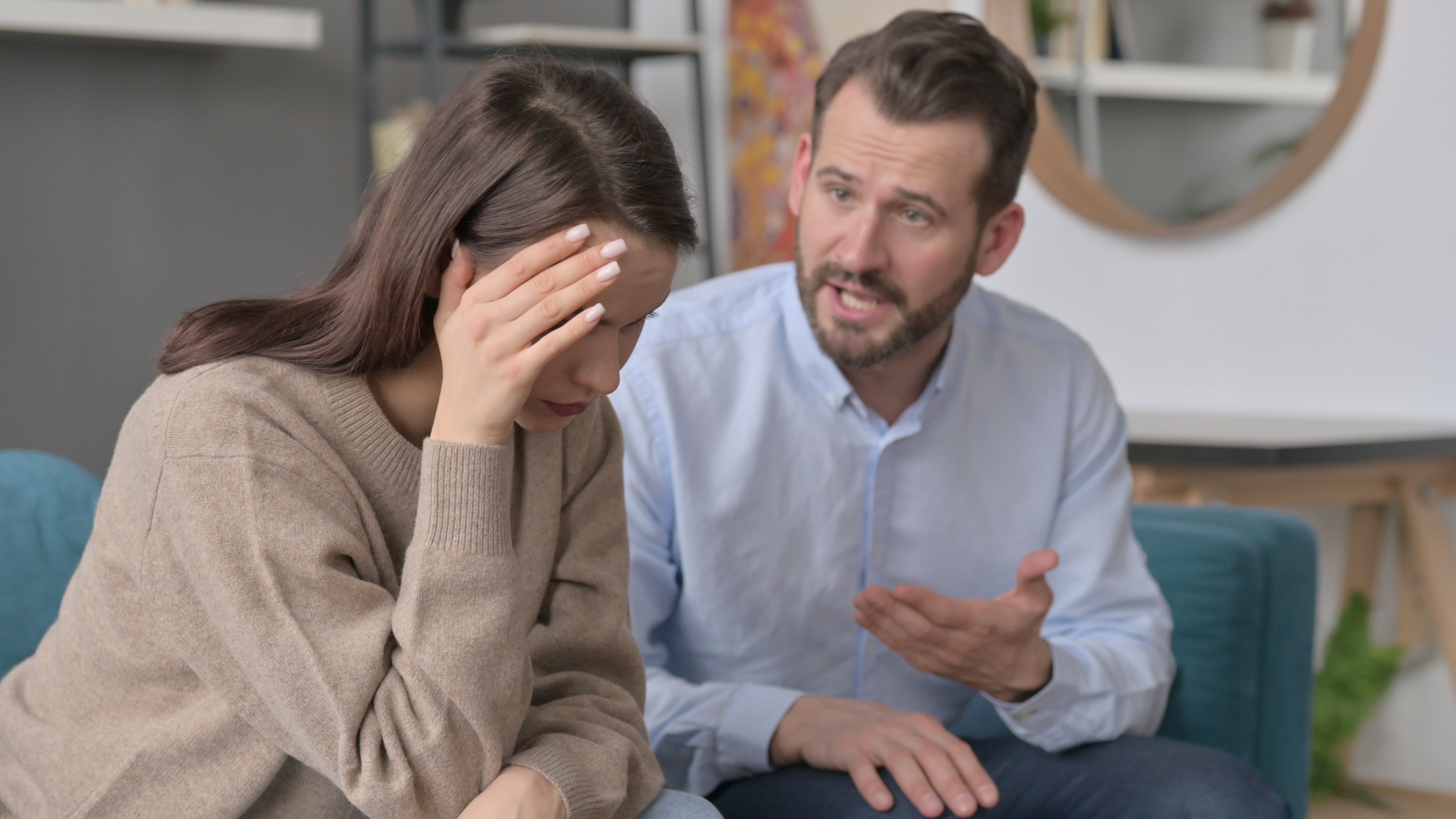 Woman feels stressed during an argument with her husband | Source: Shutterstock